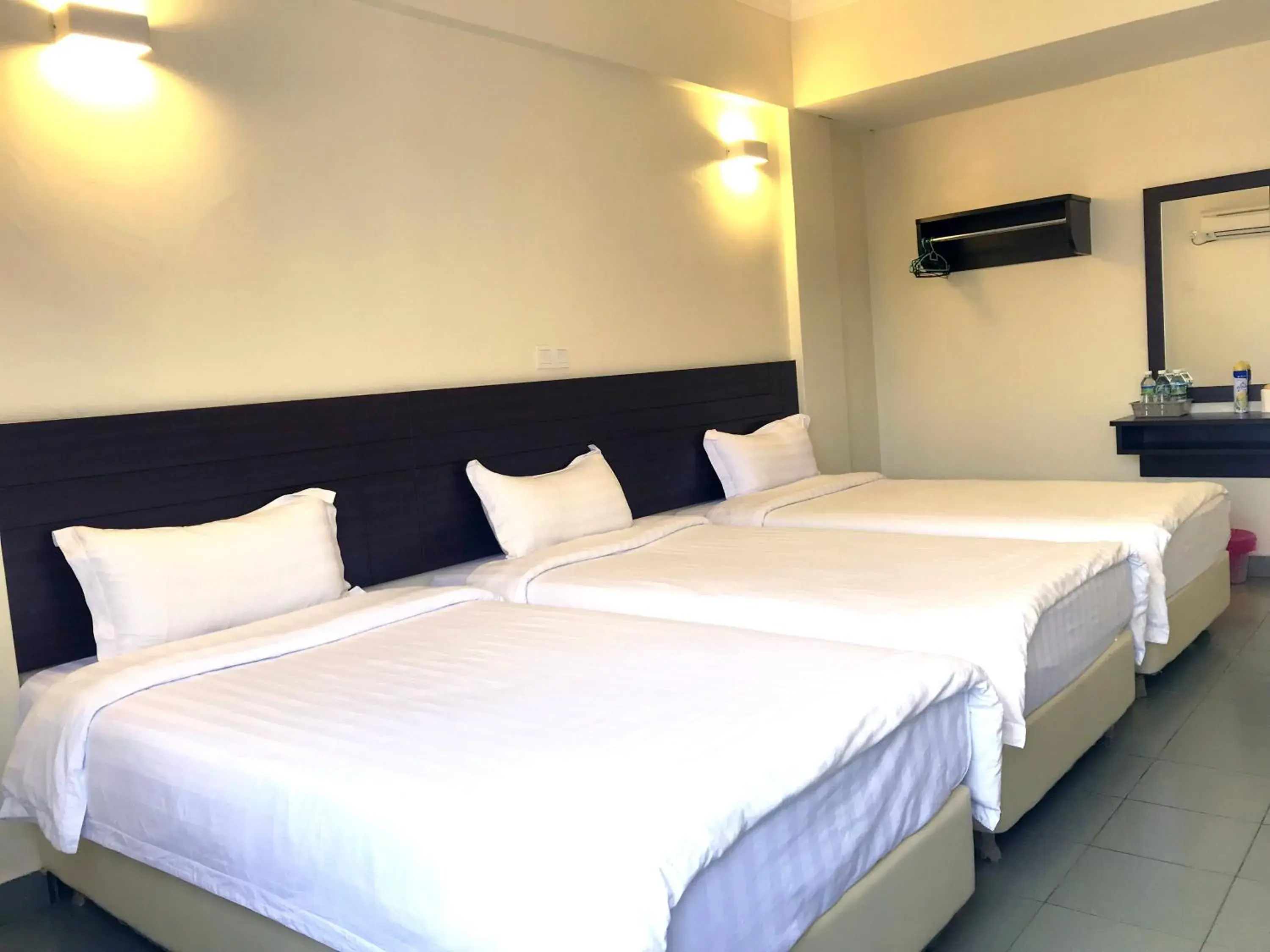 Bed in Hotel Sitiawan