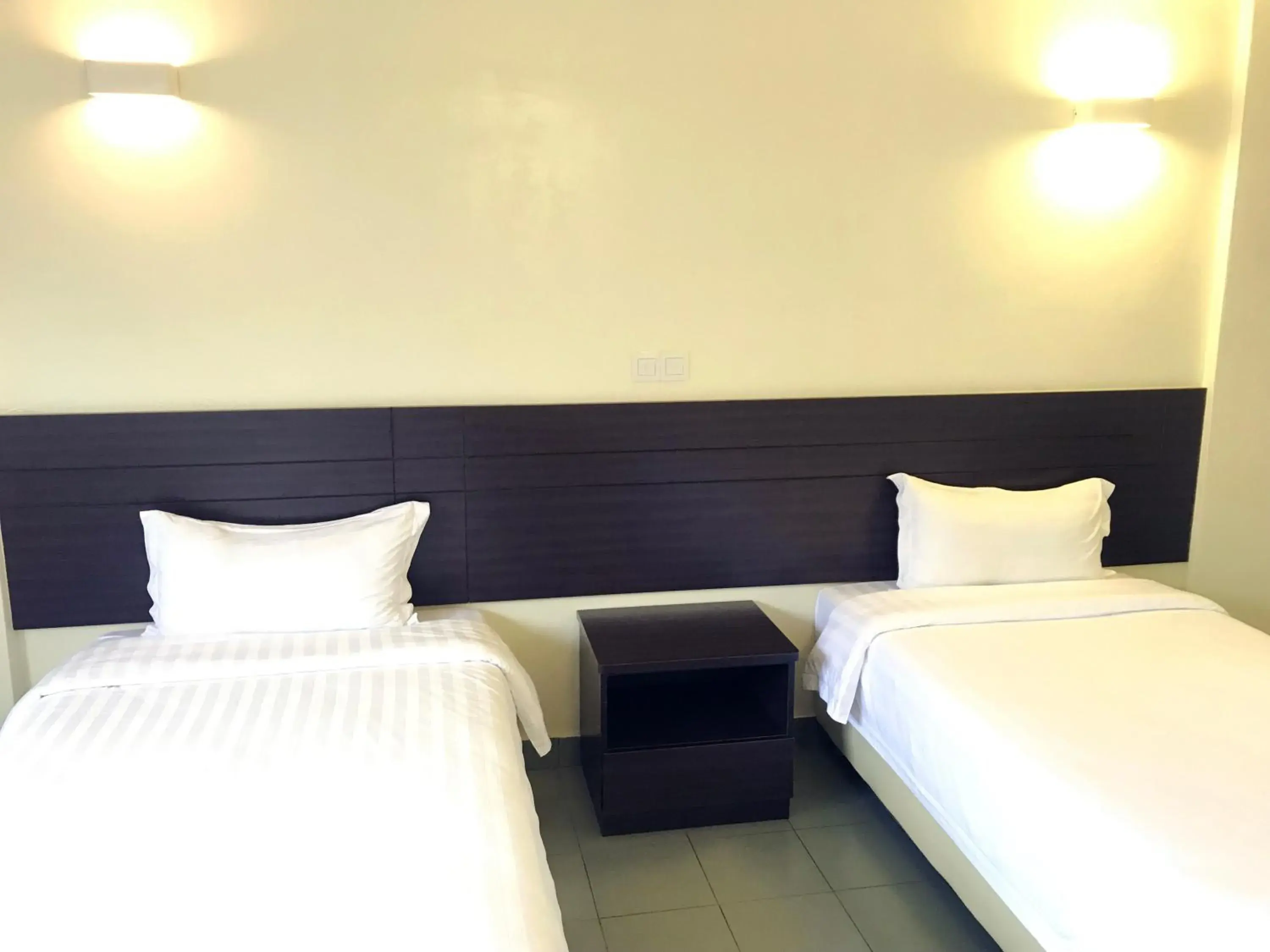 Bed in Hotel Sitiawan