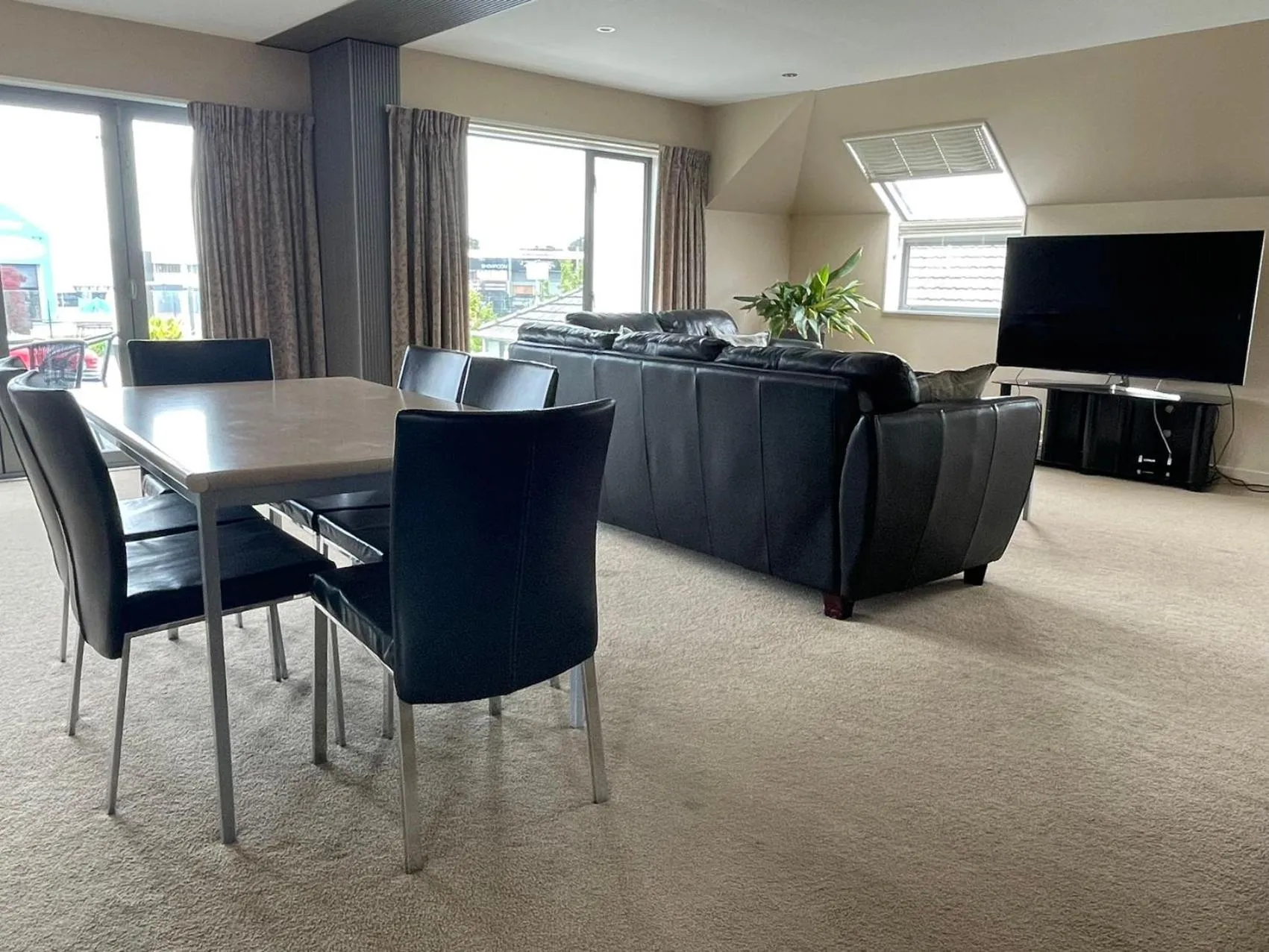 Living room in Alpha Motel with Spa-Bath