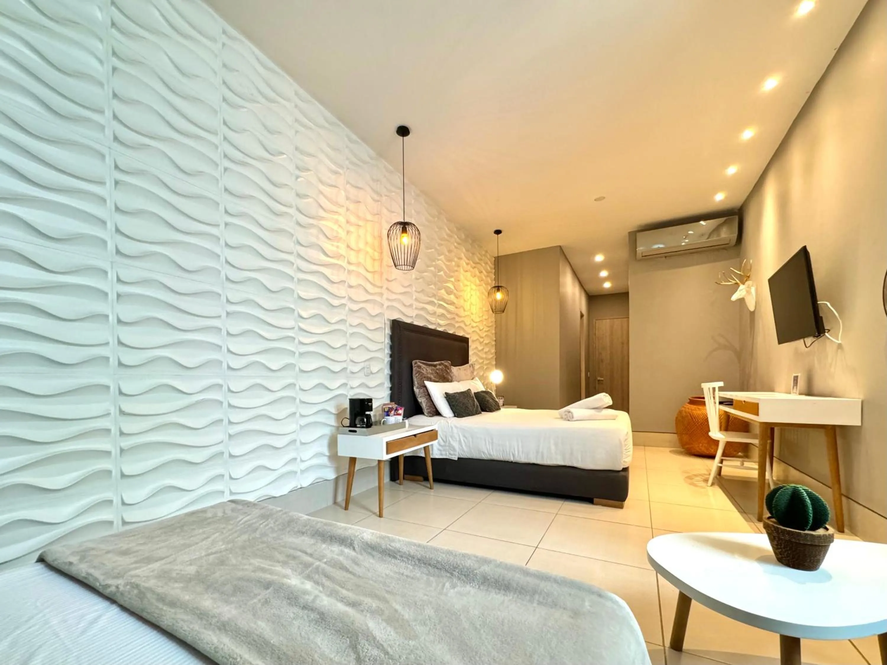 Photo of the whole room, Bed in Bonita Bay Concept Hotel by Xarm Hotels