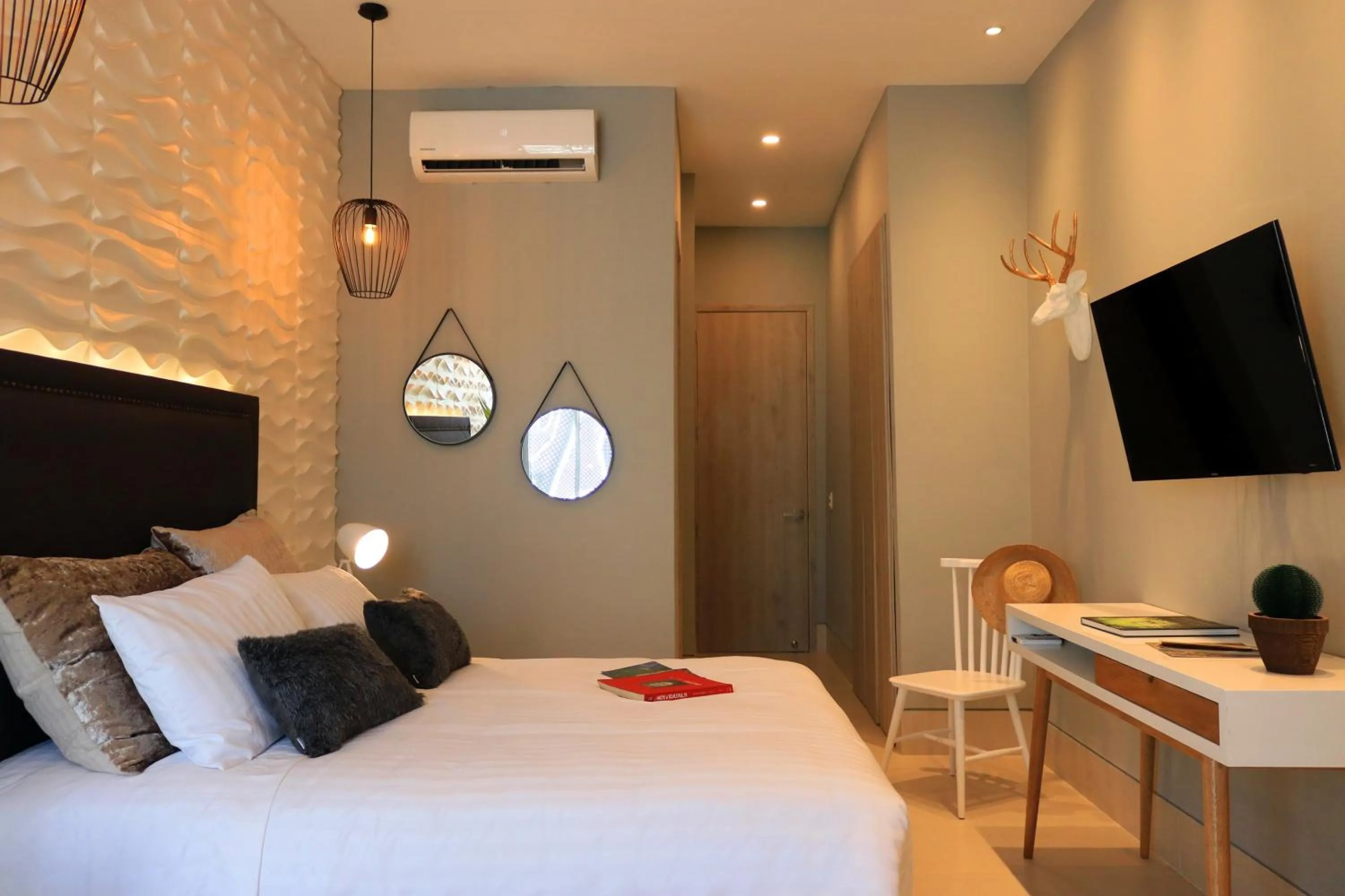 Photo of the whole room, Bed in Bonita Bay Concept Hotel by Xarm Hotels