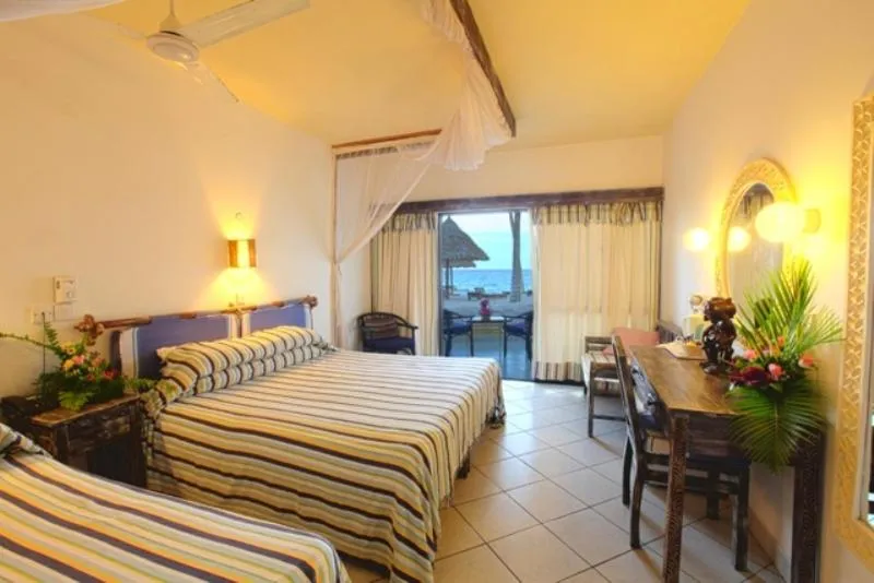 Bed in Turtle Bay Beach Club- All Inclusive