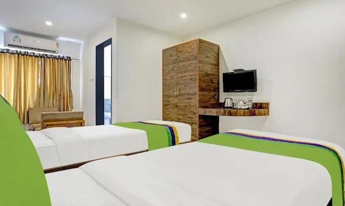 Bed in Hotel Varsha Palace