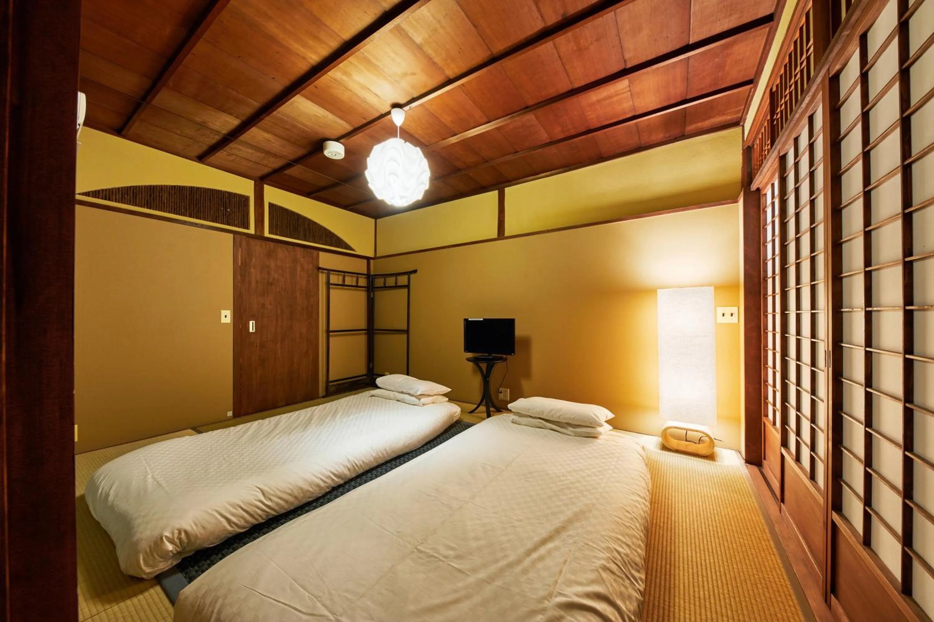 Bedroom, Bed in Kyomachiya Hotel Mifuku