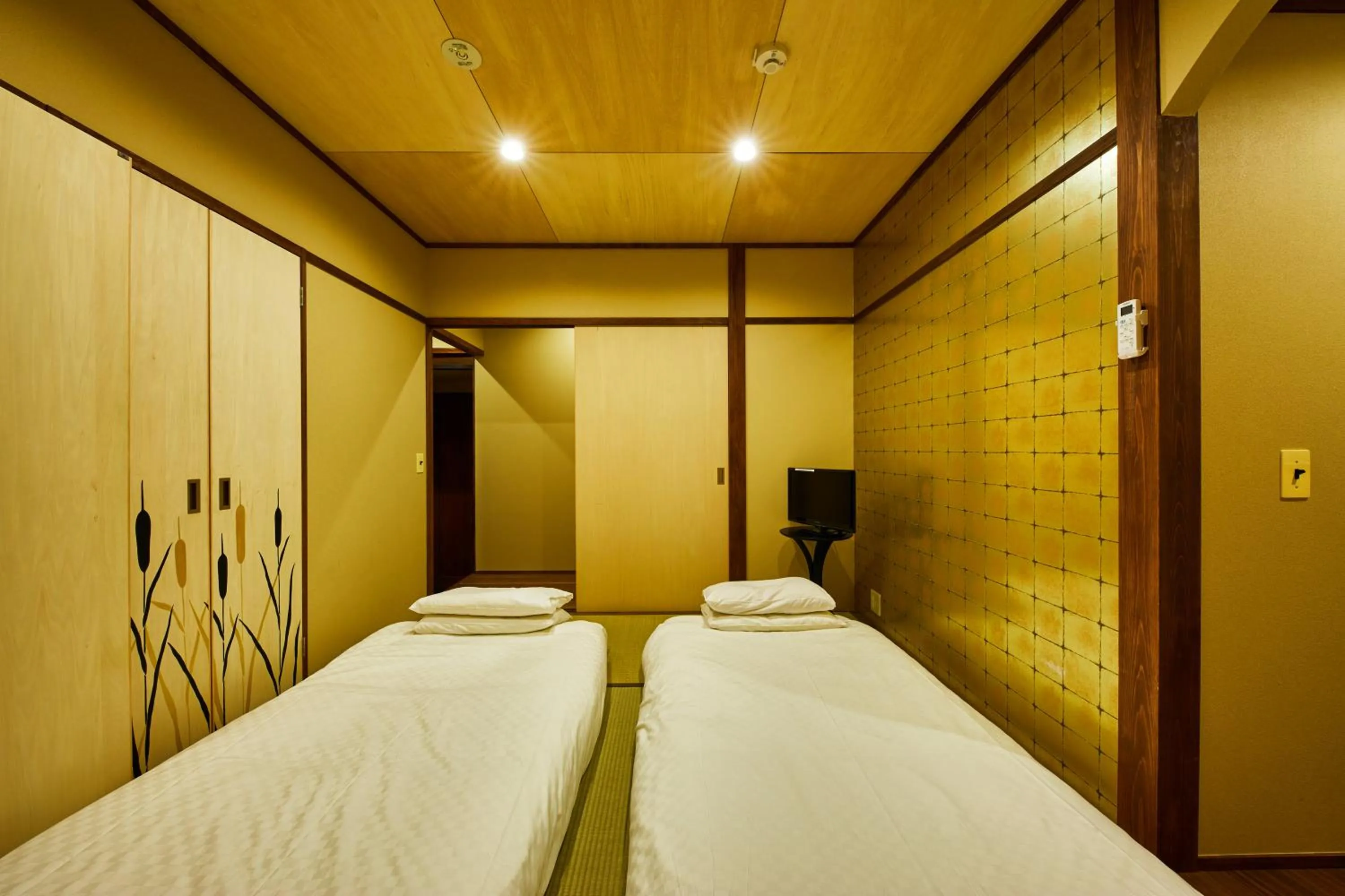 Bedroom, Bed in Kyomachiya Hotel Mifuku