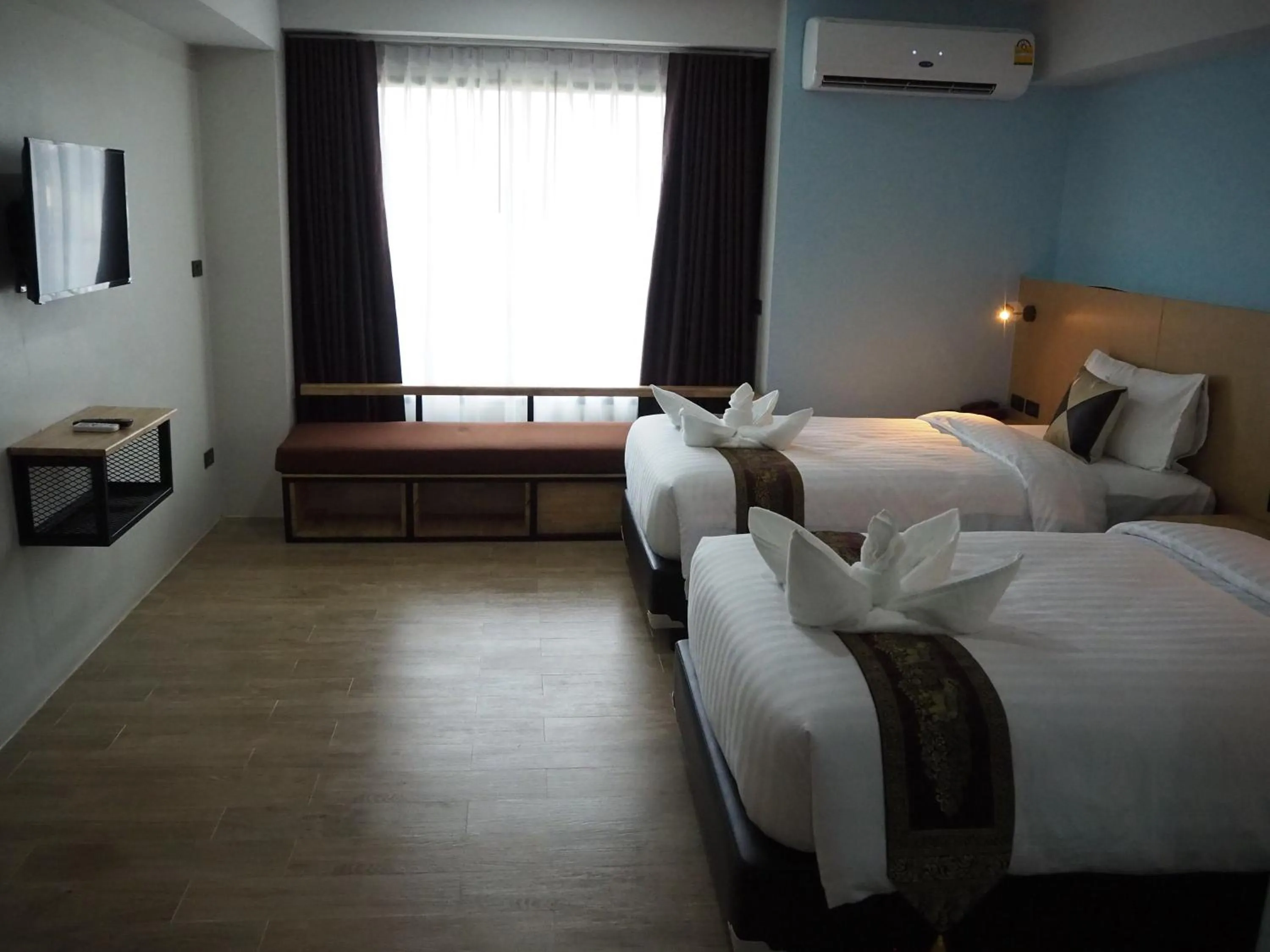 Bed in Samui City Hotel