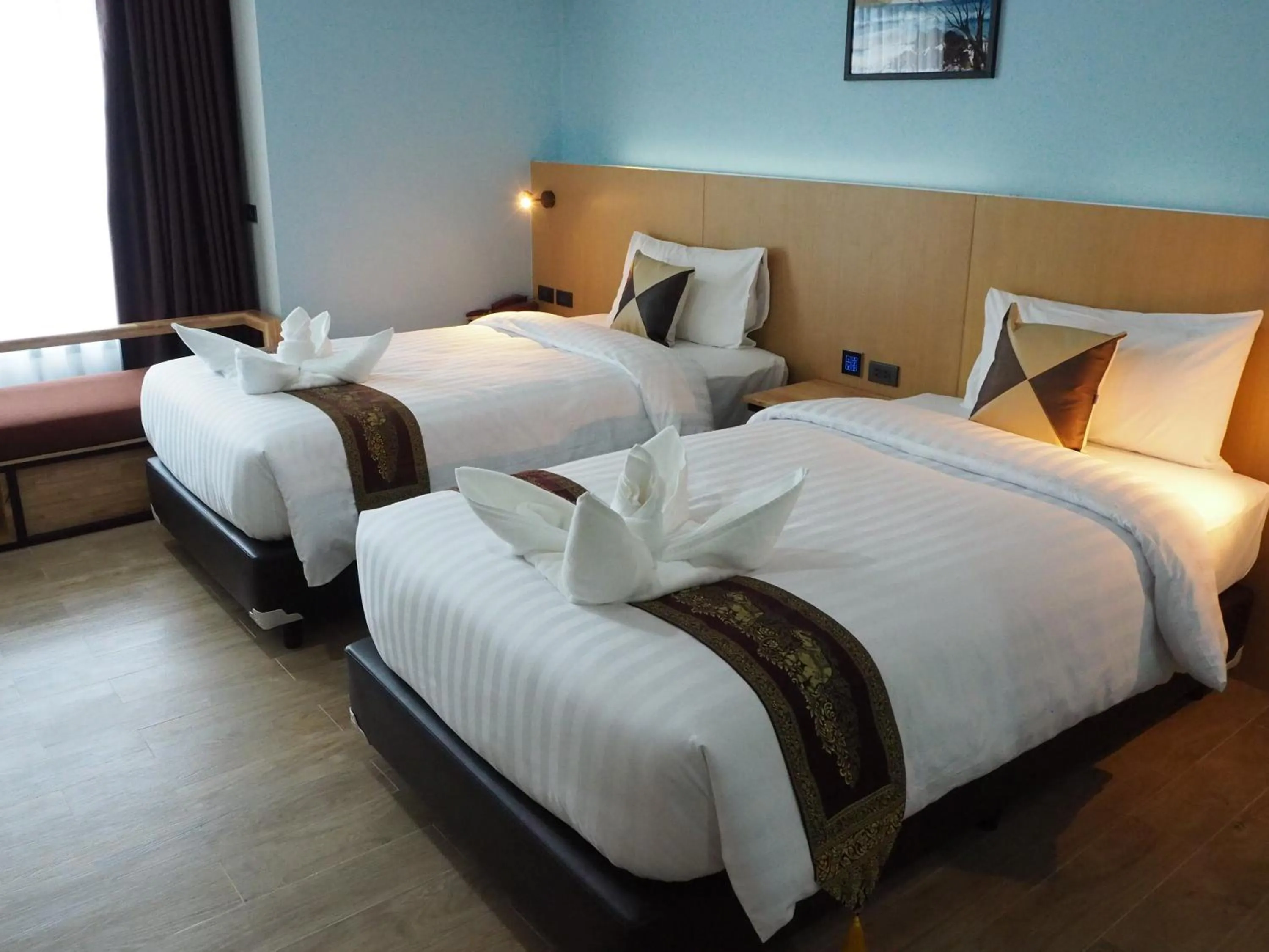 Bed in Samui City Hotel