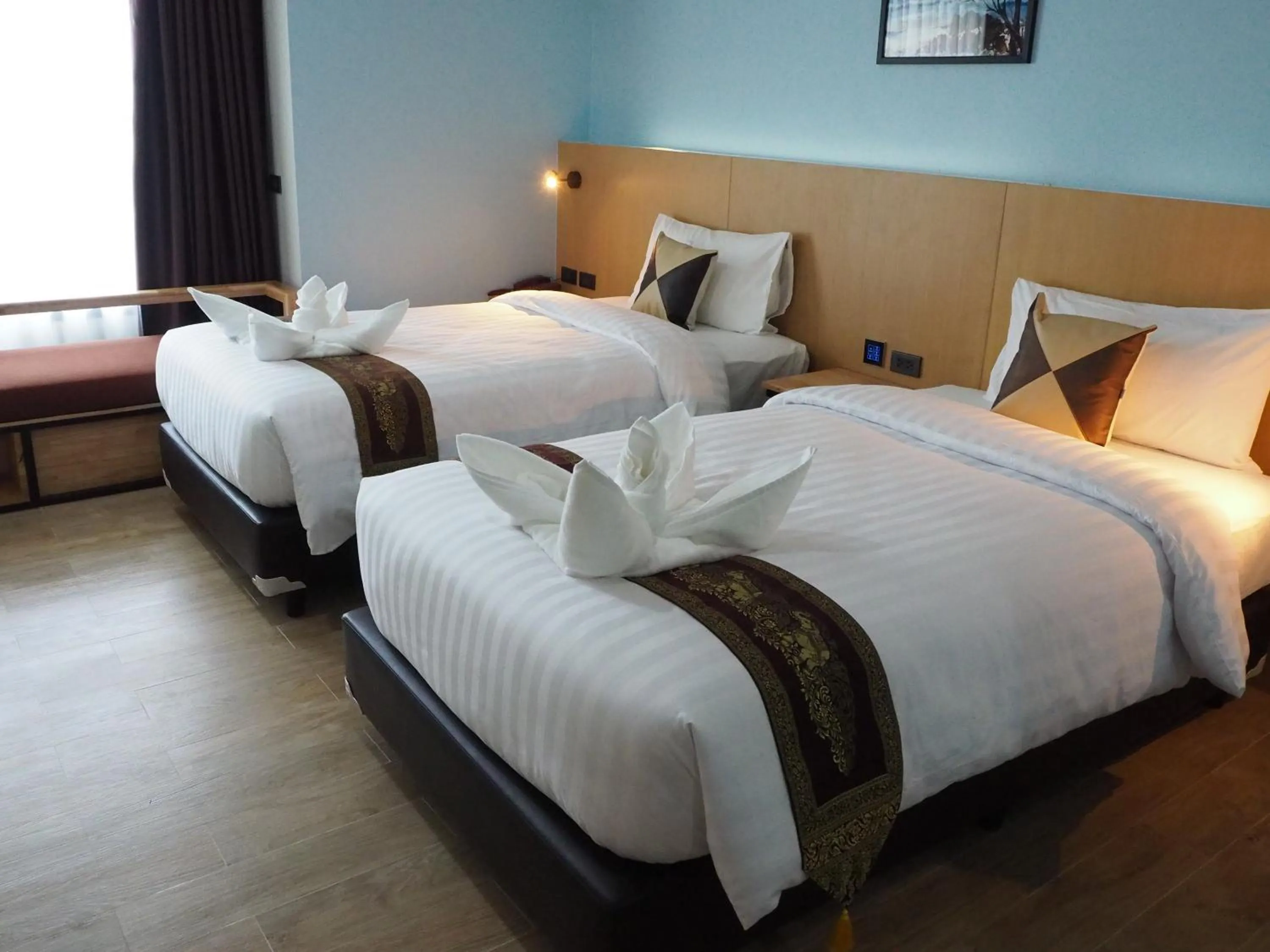 Bed in Samui City Hotel