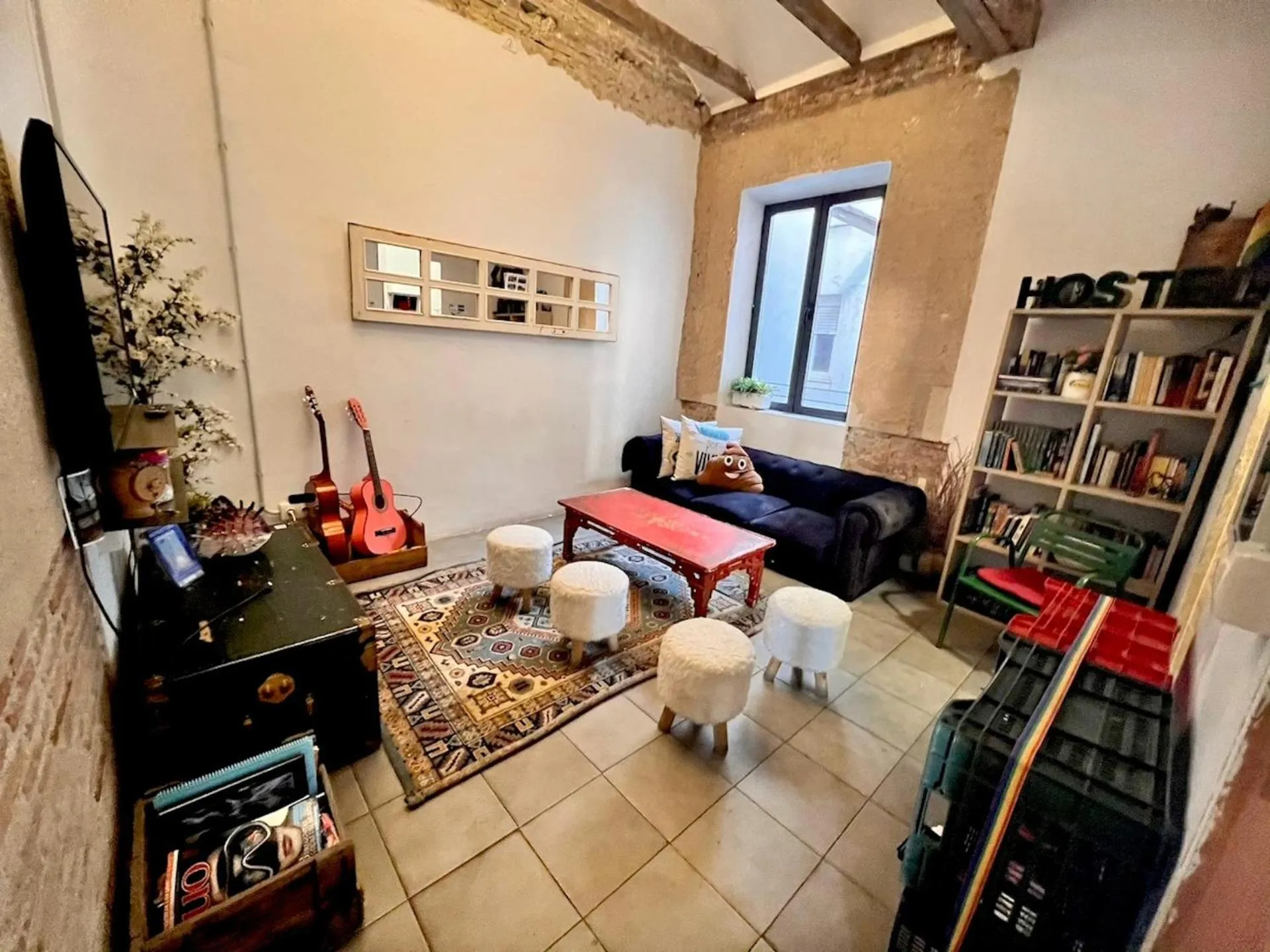 Communal lounge/ TV room in ECO Hostel