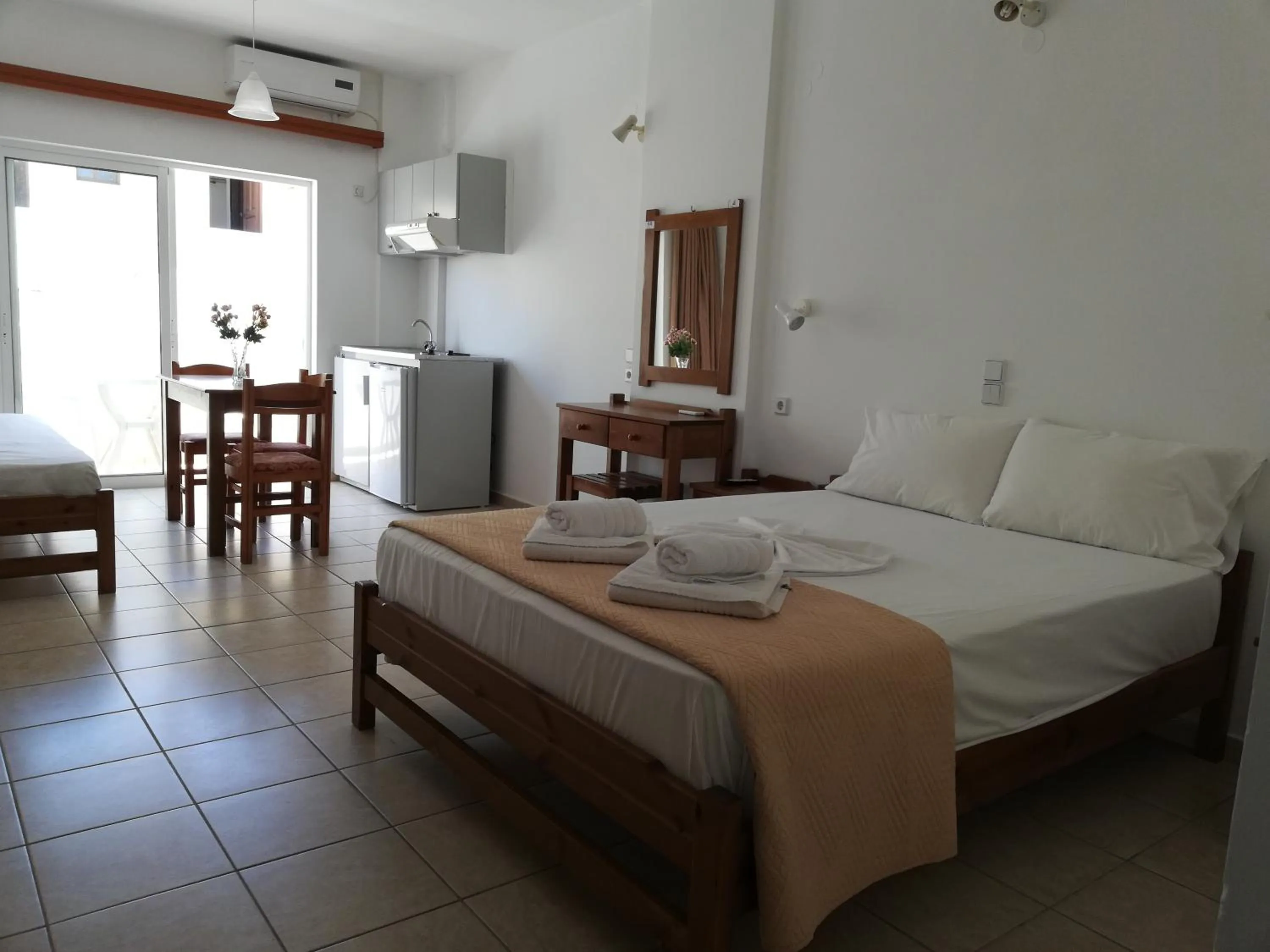 Bed in Karmi Apartments