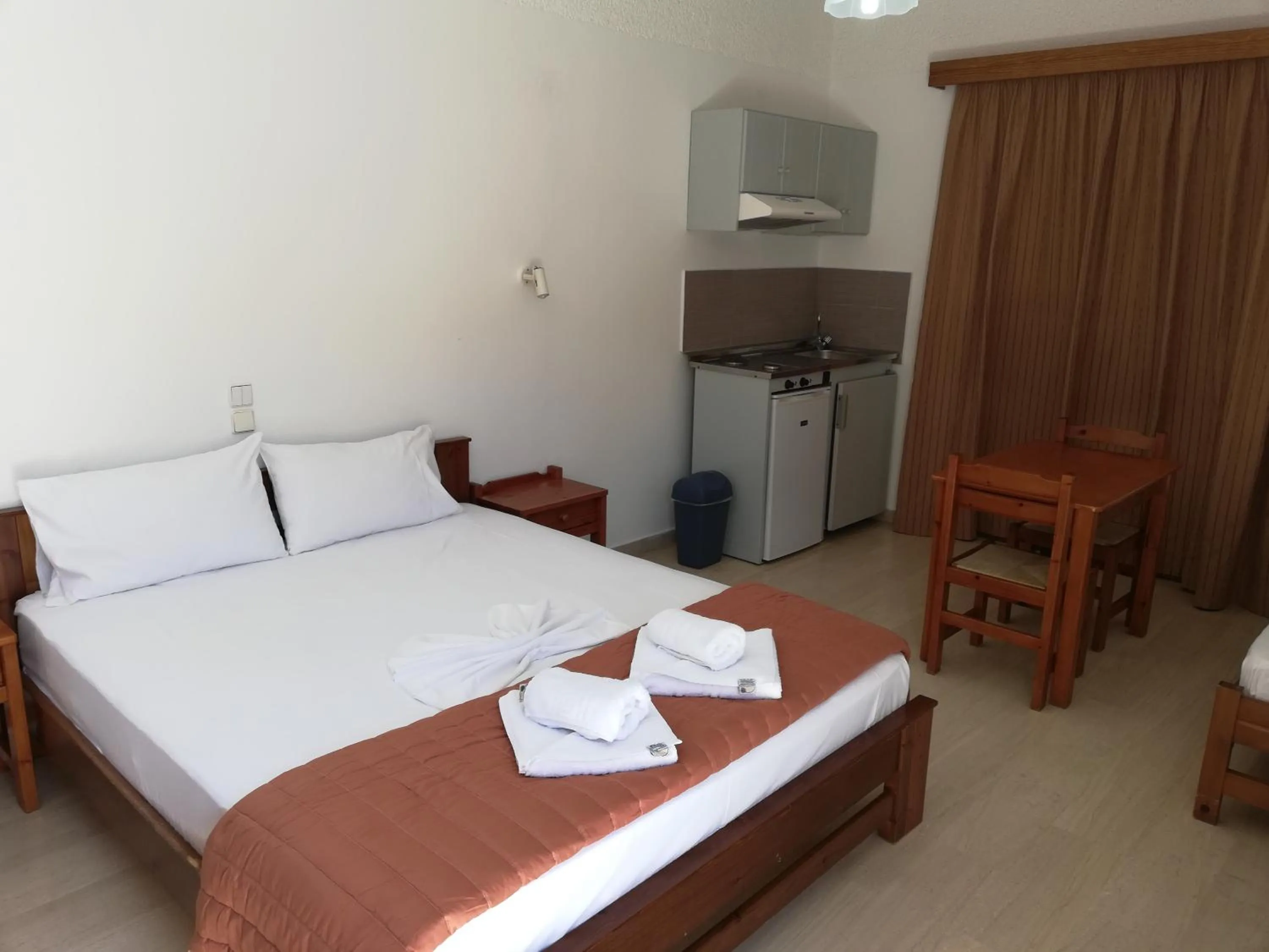 Bed in Karmi Apartments