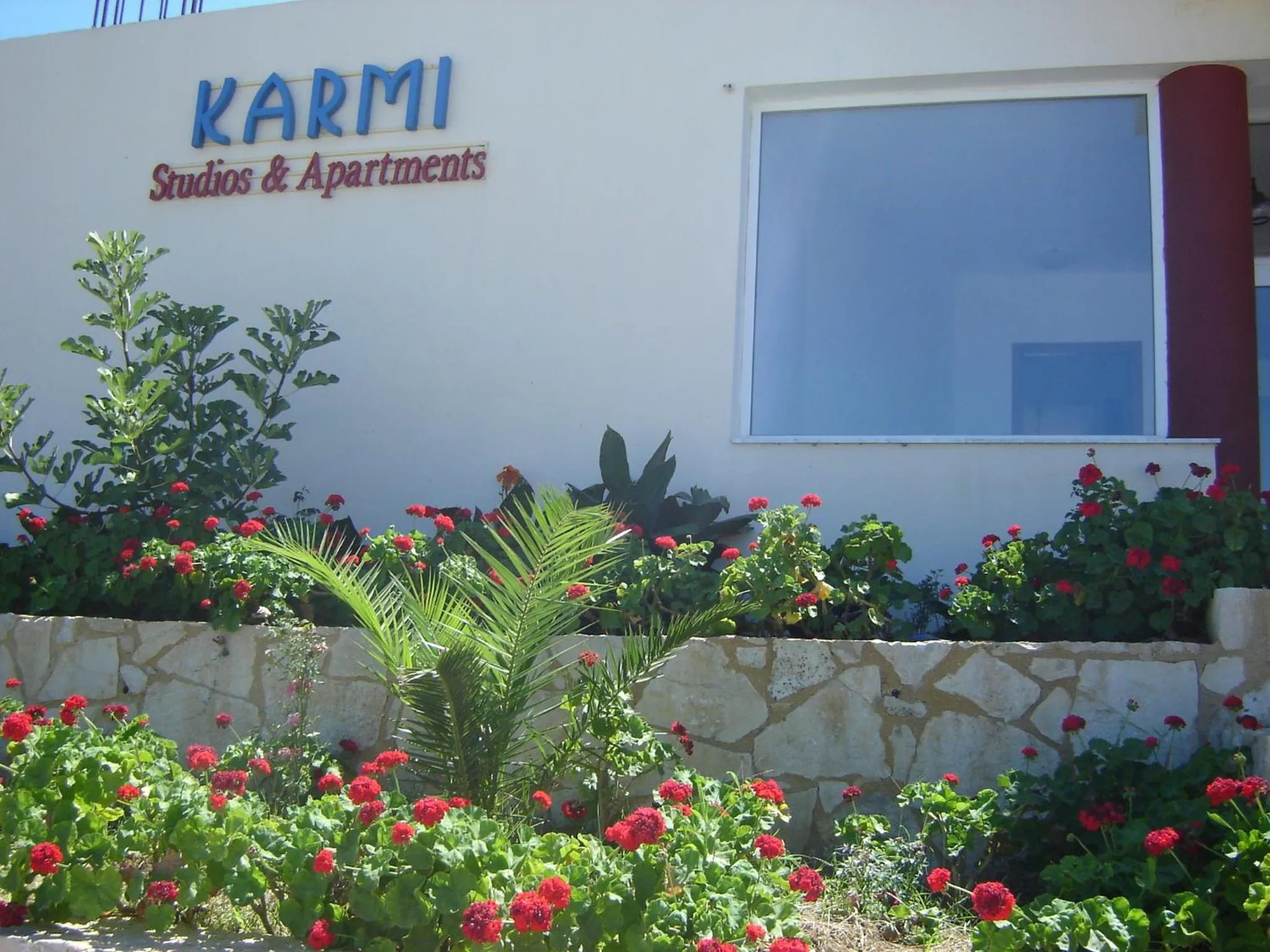 Property logo or sign in Karmi Apartments