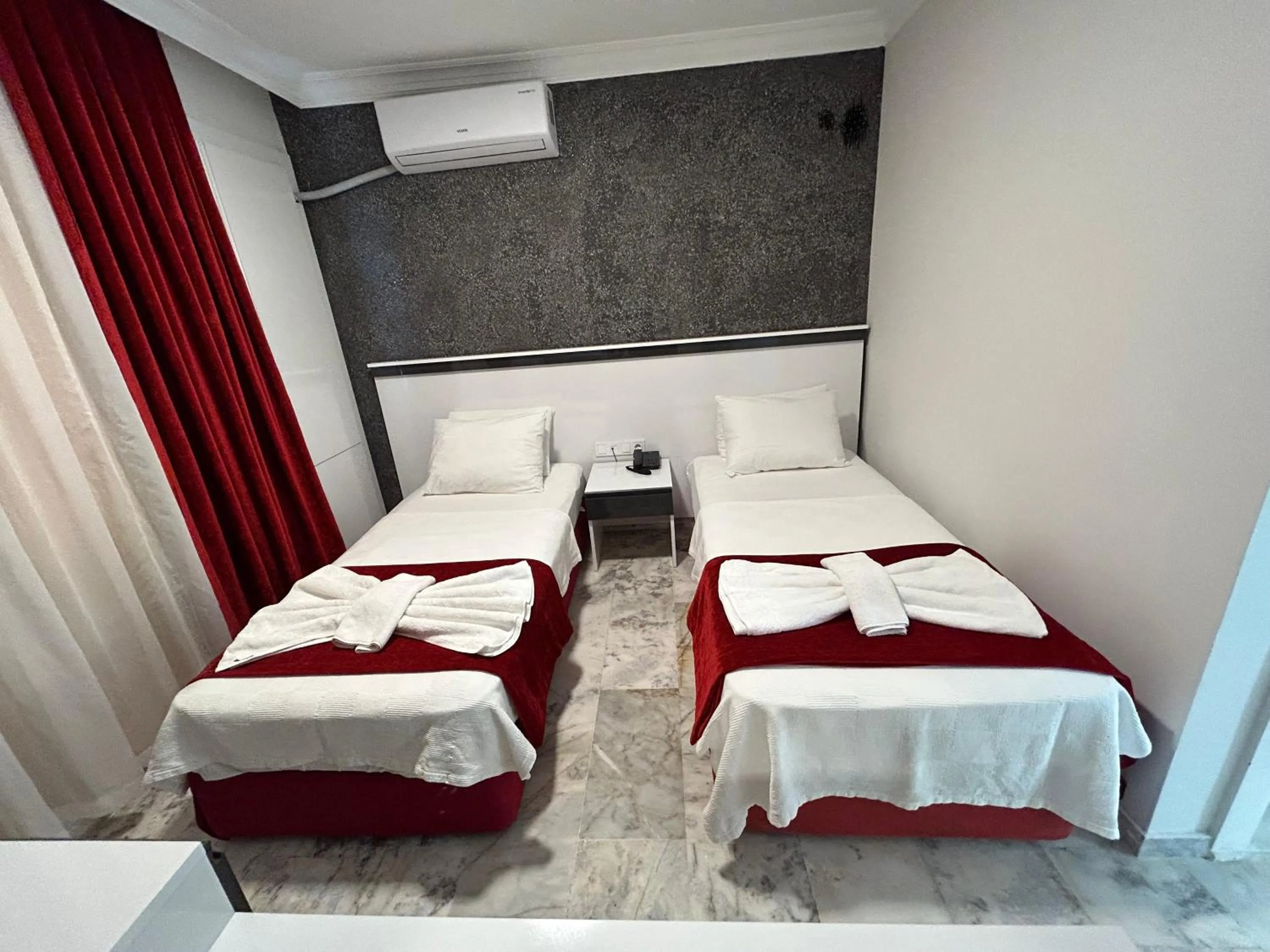 Bedroom in Bellissima Hotel