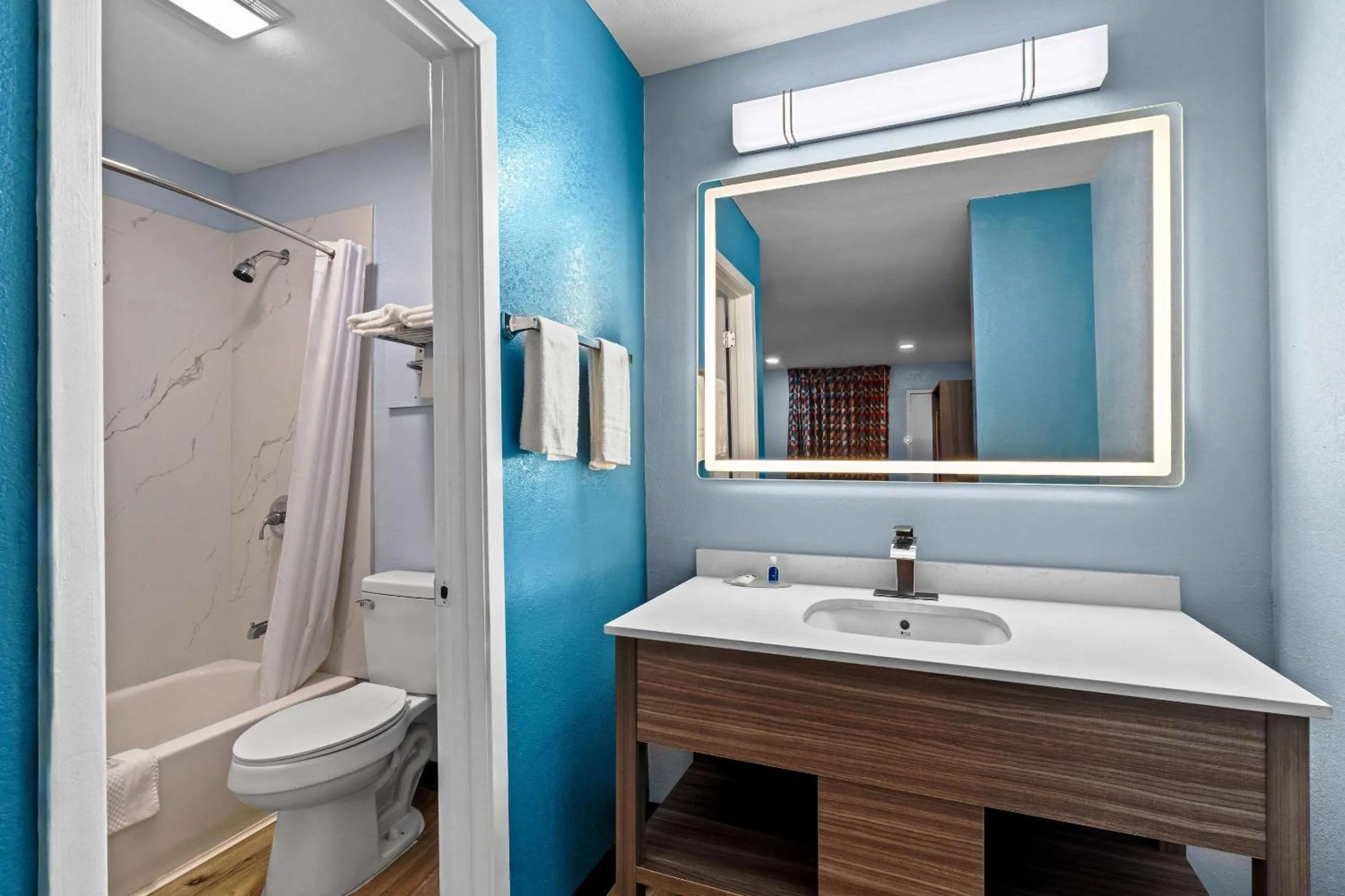 Bedroom in Rodeway Inn & Suites