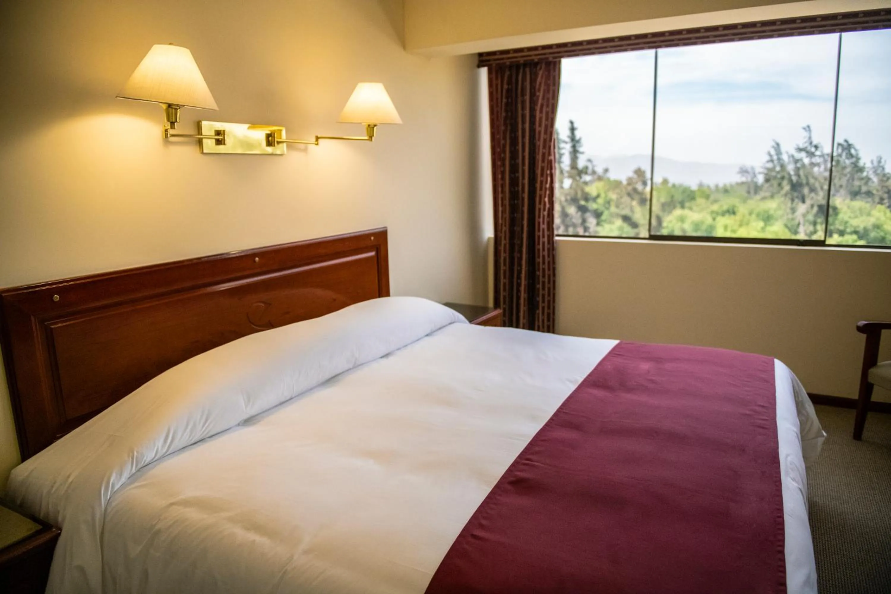 Bed in El Cabildo Hotel