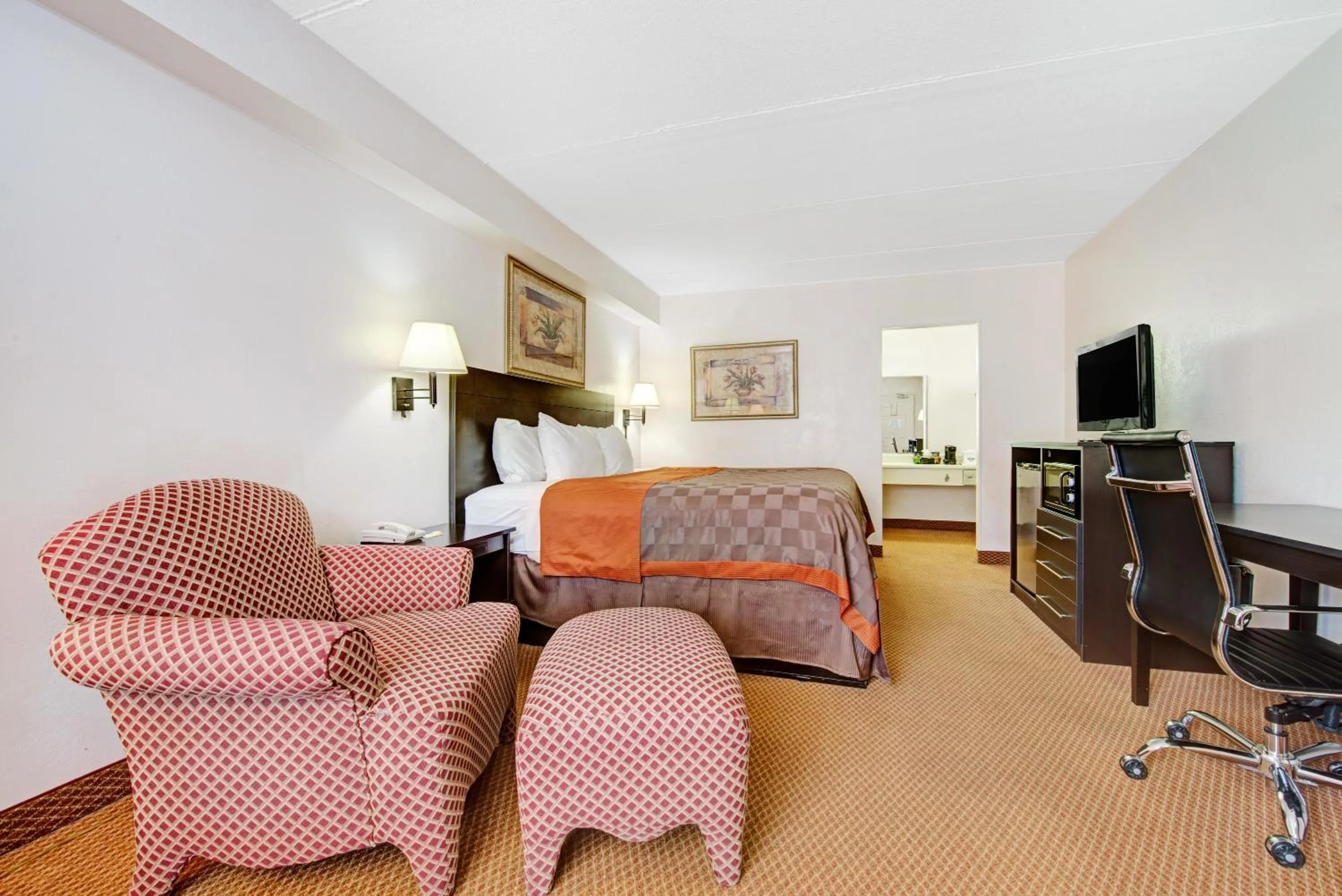 Bedroom, Seating Area in Deluxe Inn San Antonio Near Lackland AFB