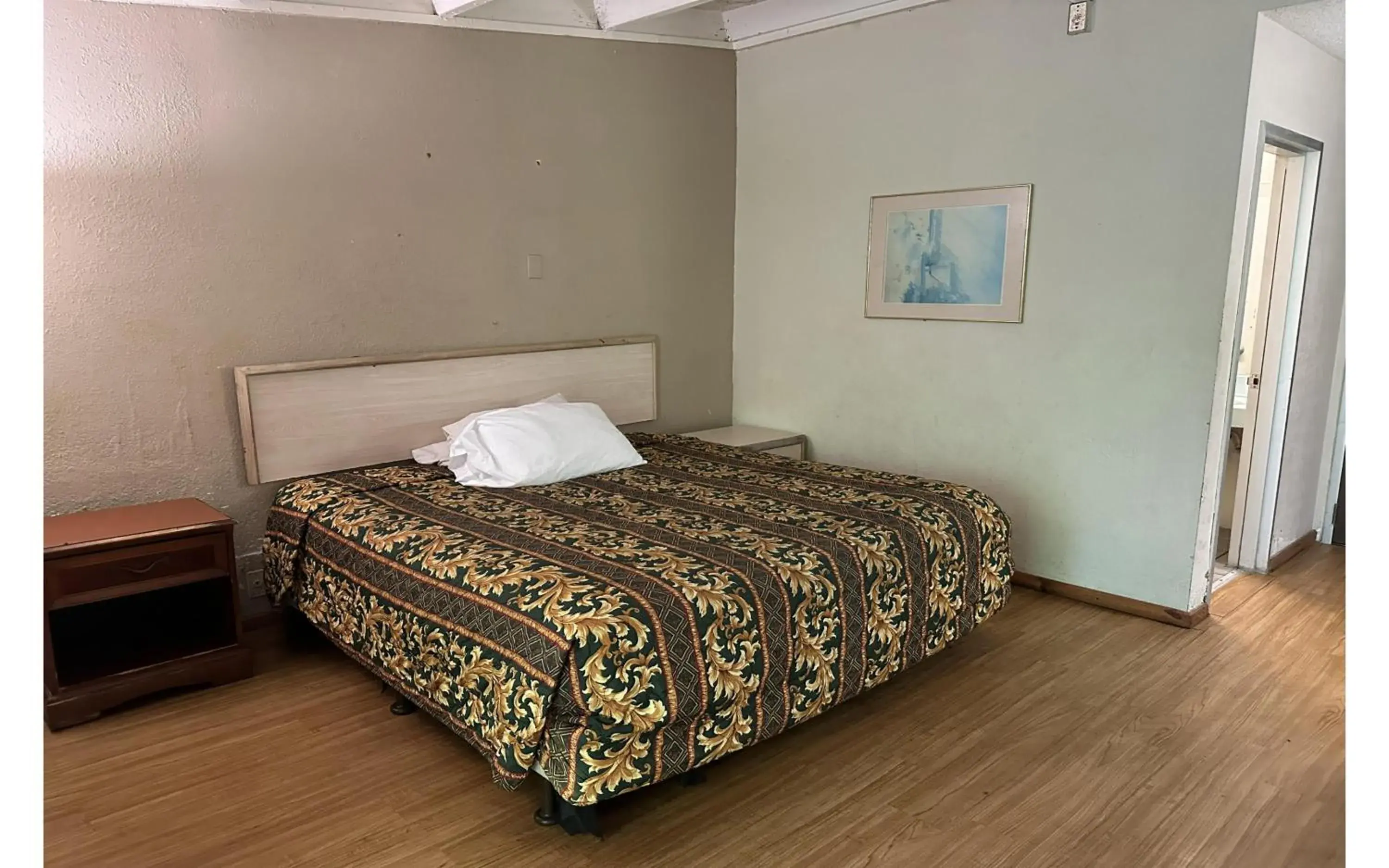 Bedroom, Bed in Kampus Inn by Hotel O Gainesville - University Area Bedroom, Bed in Kampus Inn by Hotel O Gainesville - University Area