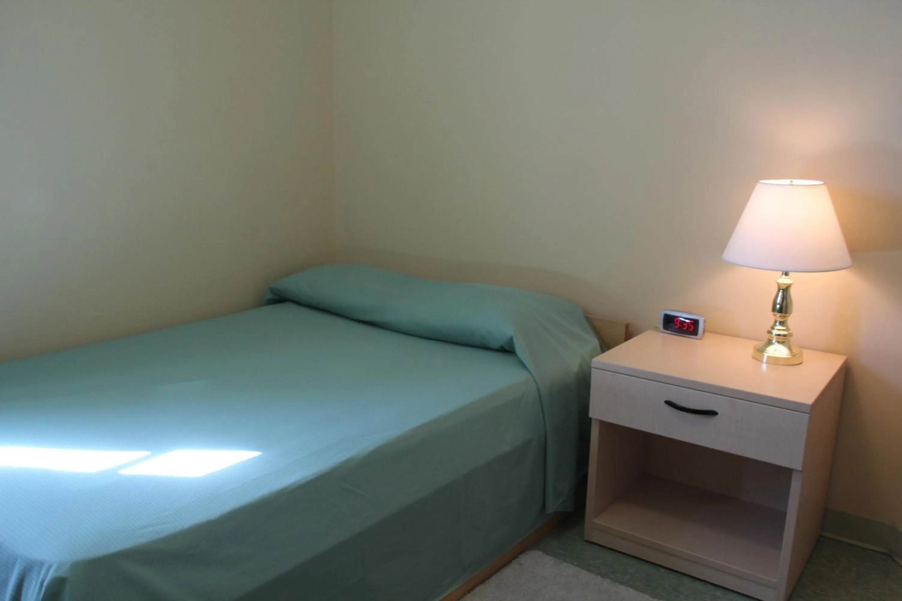 Bed in Glendenning Hall at Holland College