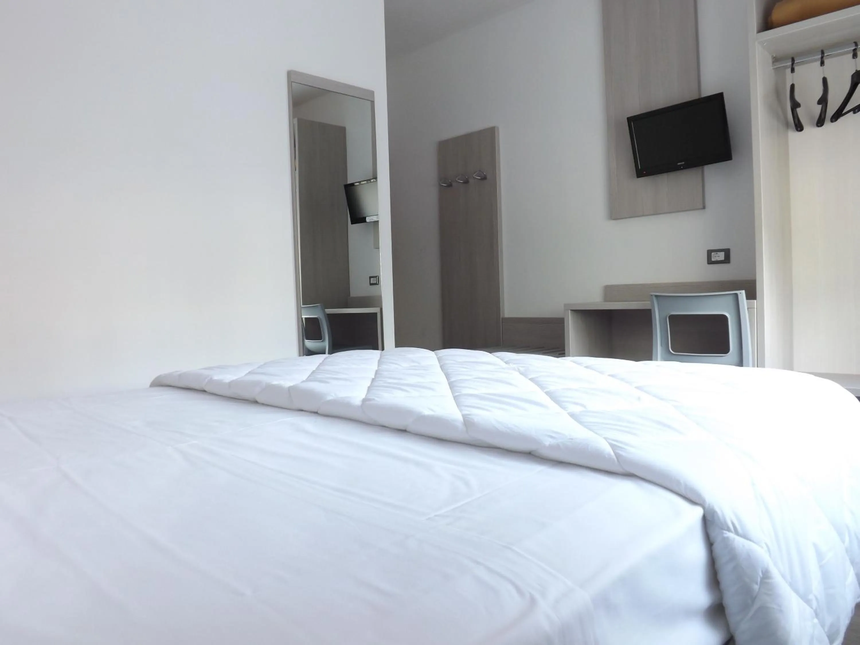 Bed in Hotel Ariston