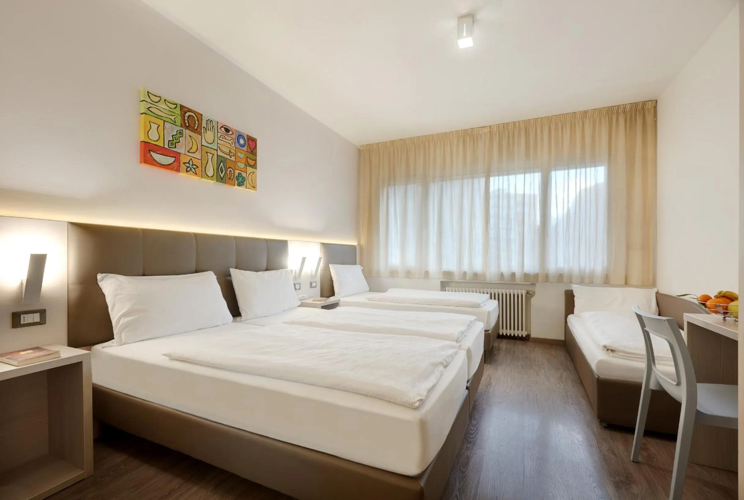 Bed in Hotel Ariston