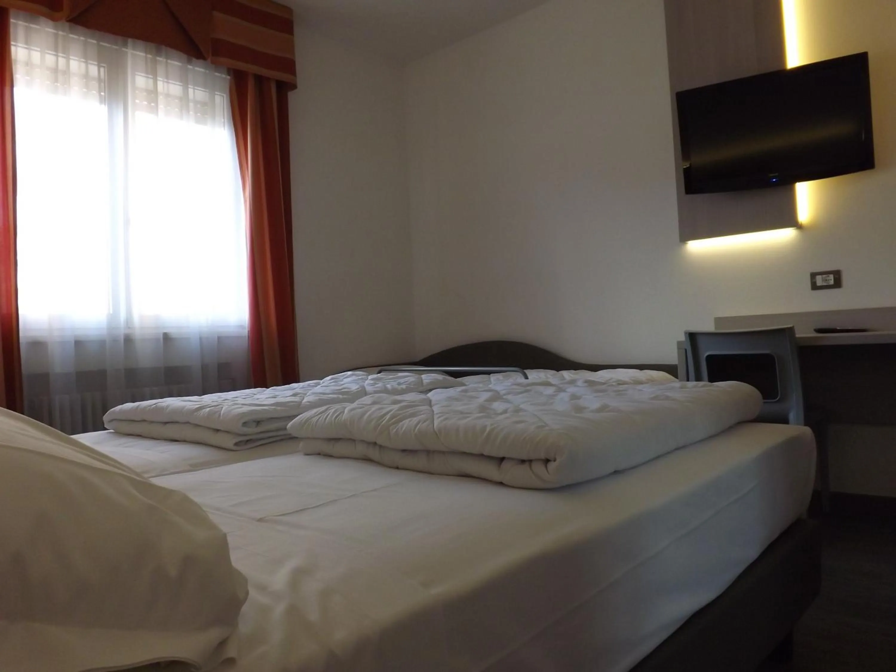 Bed in Hotel Ariston