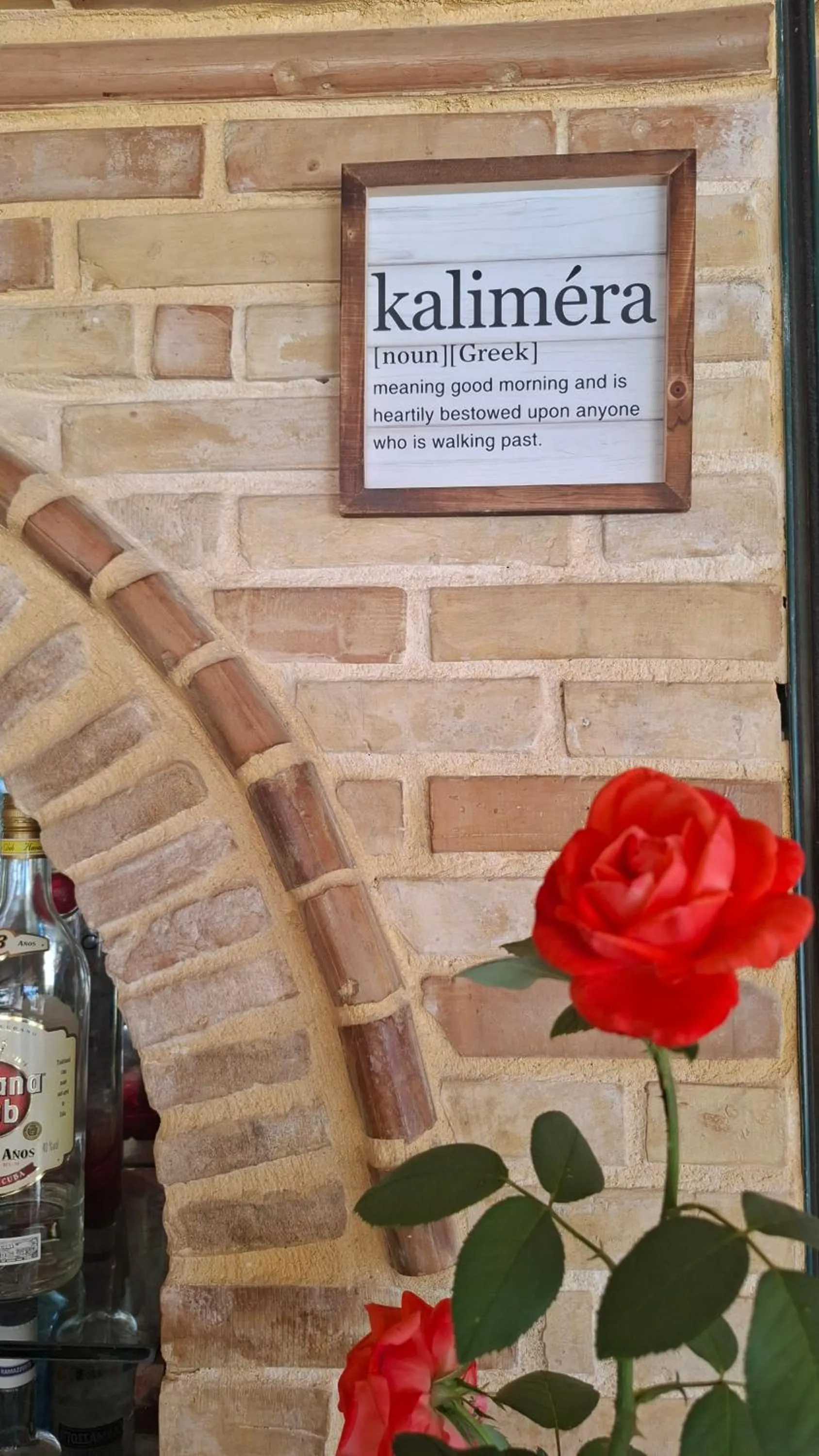 Property logo or sign in Sunflower Apartments & Studios