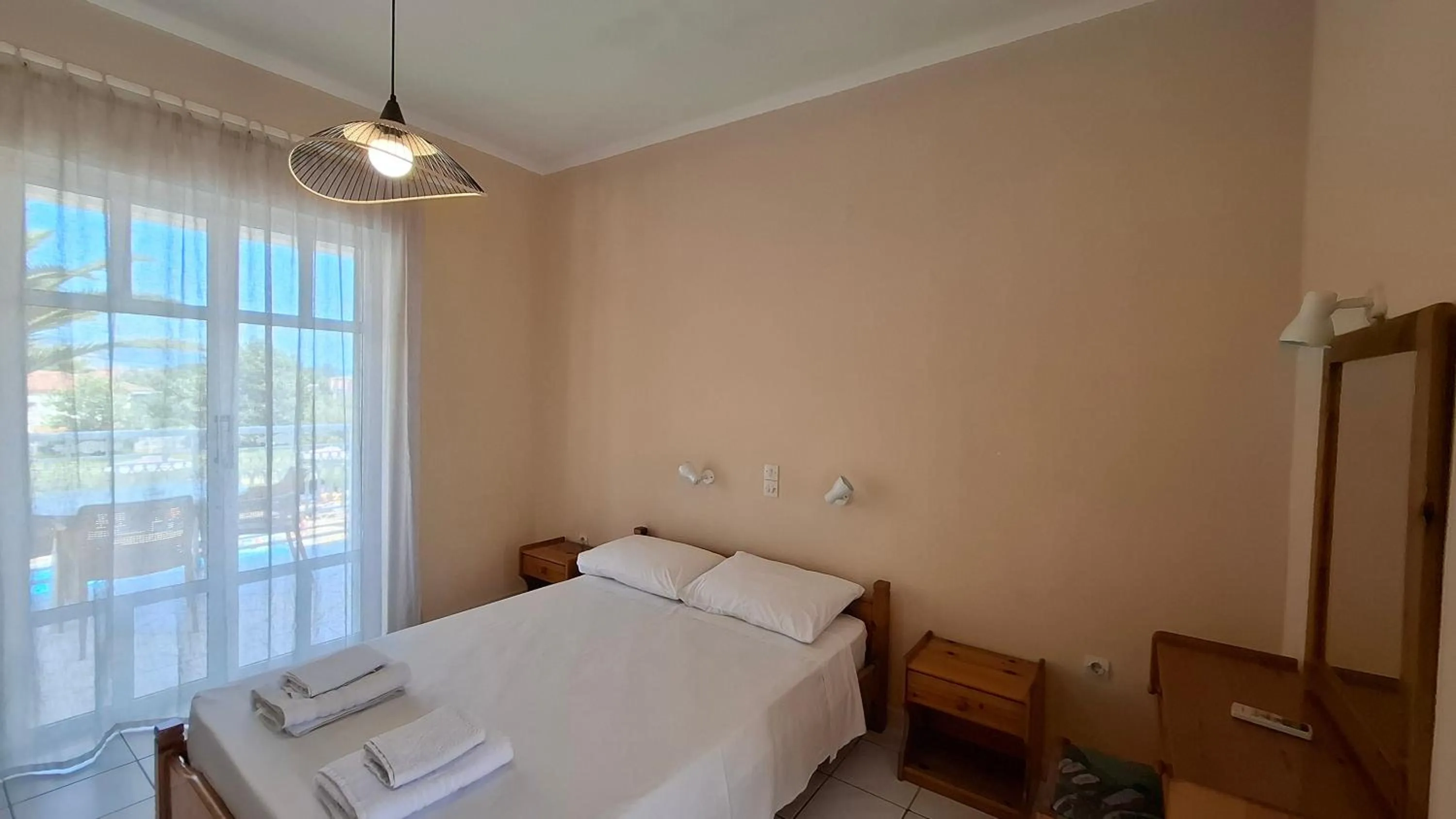 Bed in Sunflower Apartments & Studios