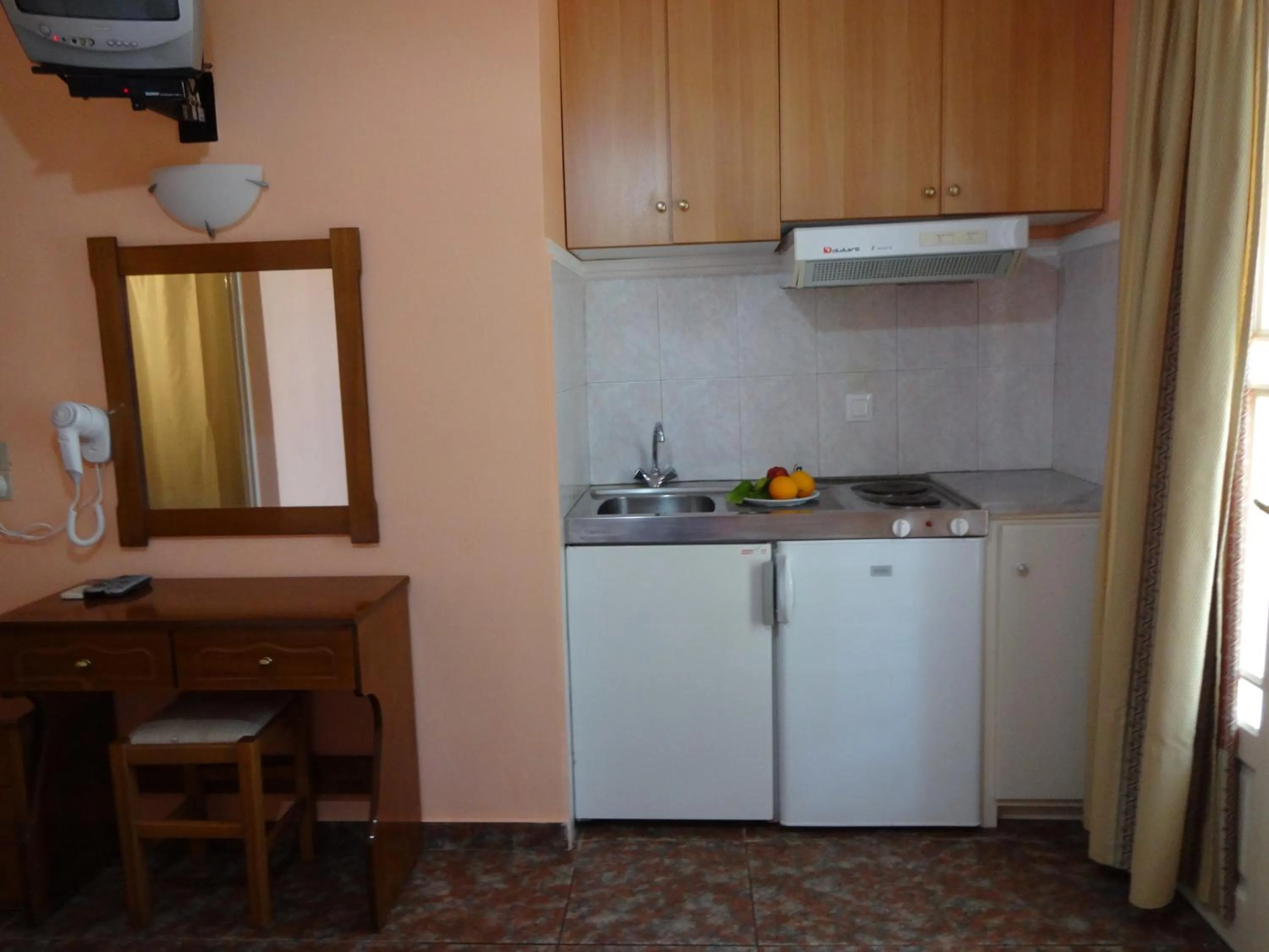 Kitchen or kitchenette in Pansion Filoxenia Apartments & Studios