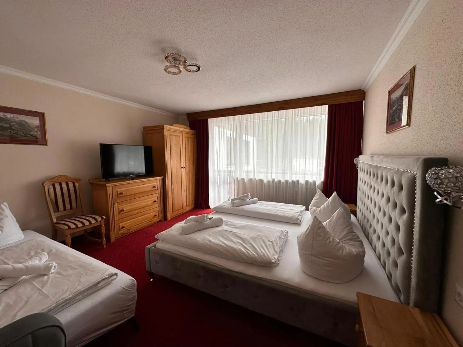 Photo of the whole room, Bed in Hotel Gundl Alm