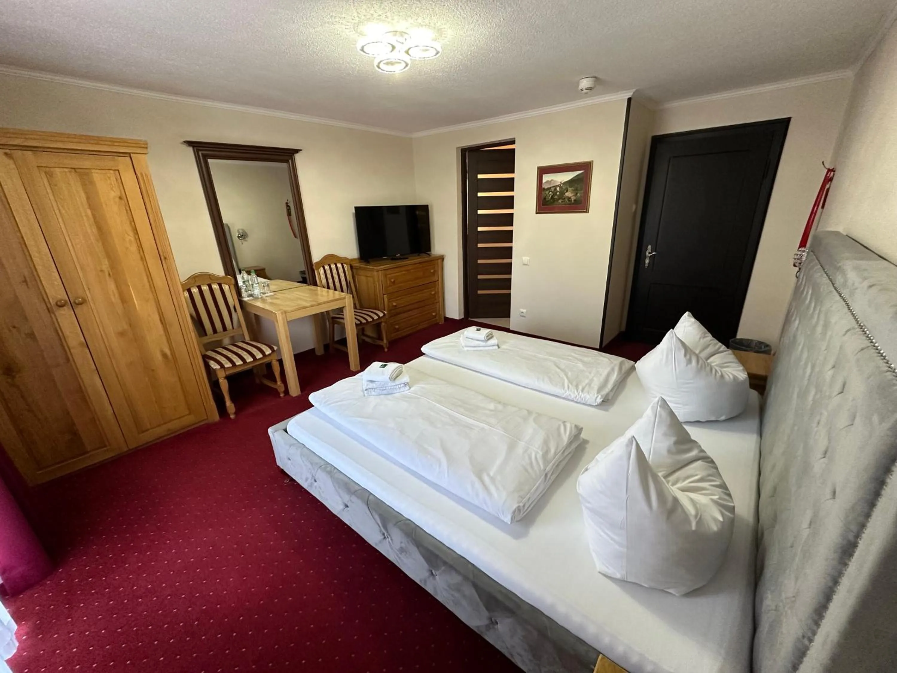 Photo of the whole room, Bed in Hotel Gundl Alm