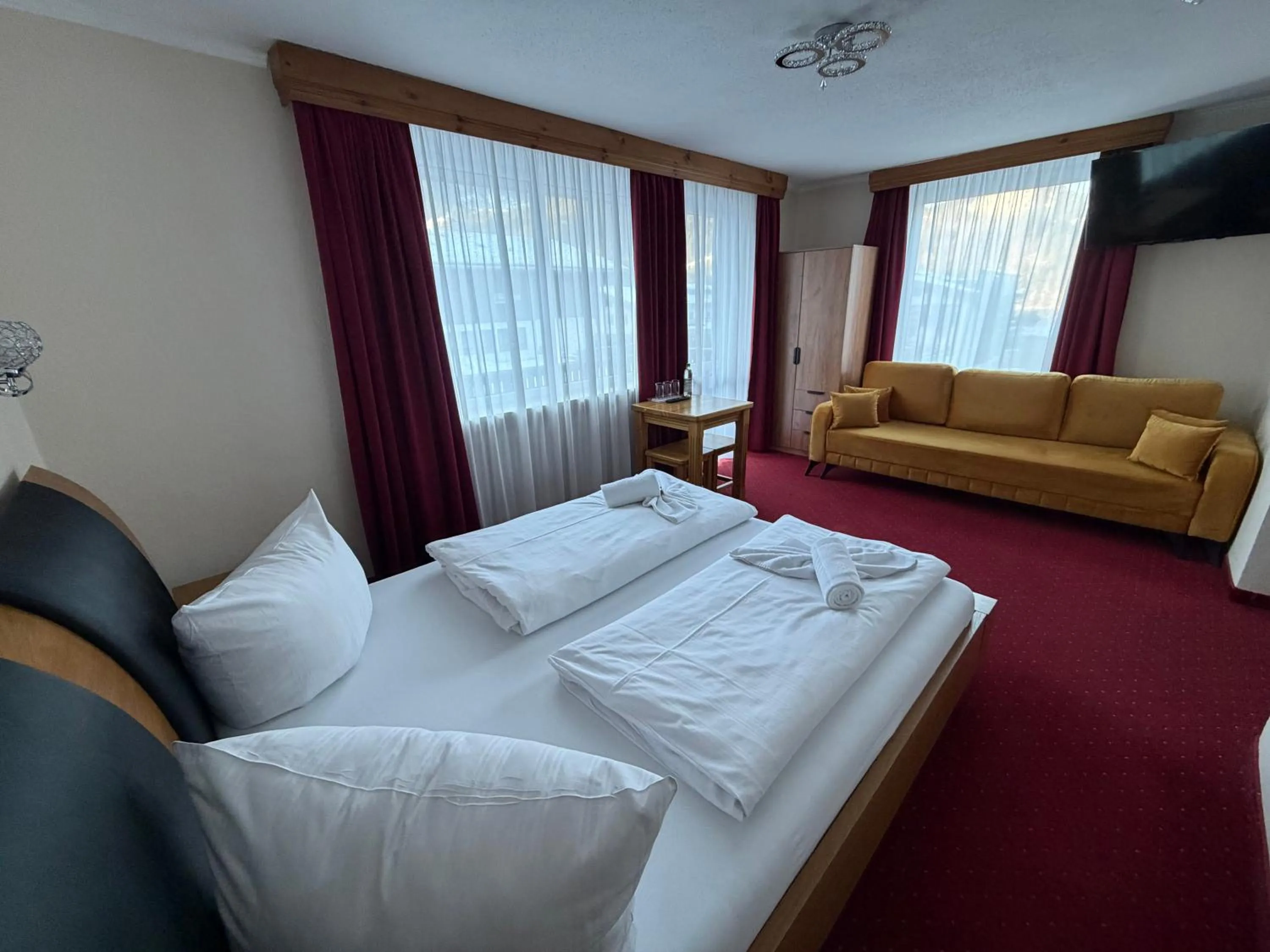 Photo of the whole room, Bed in Hotel Gundl Alm