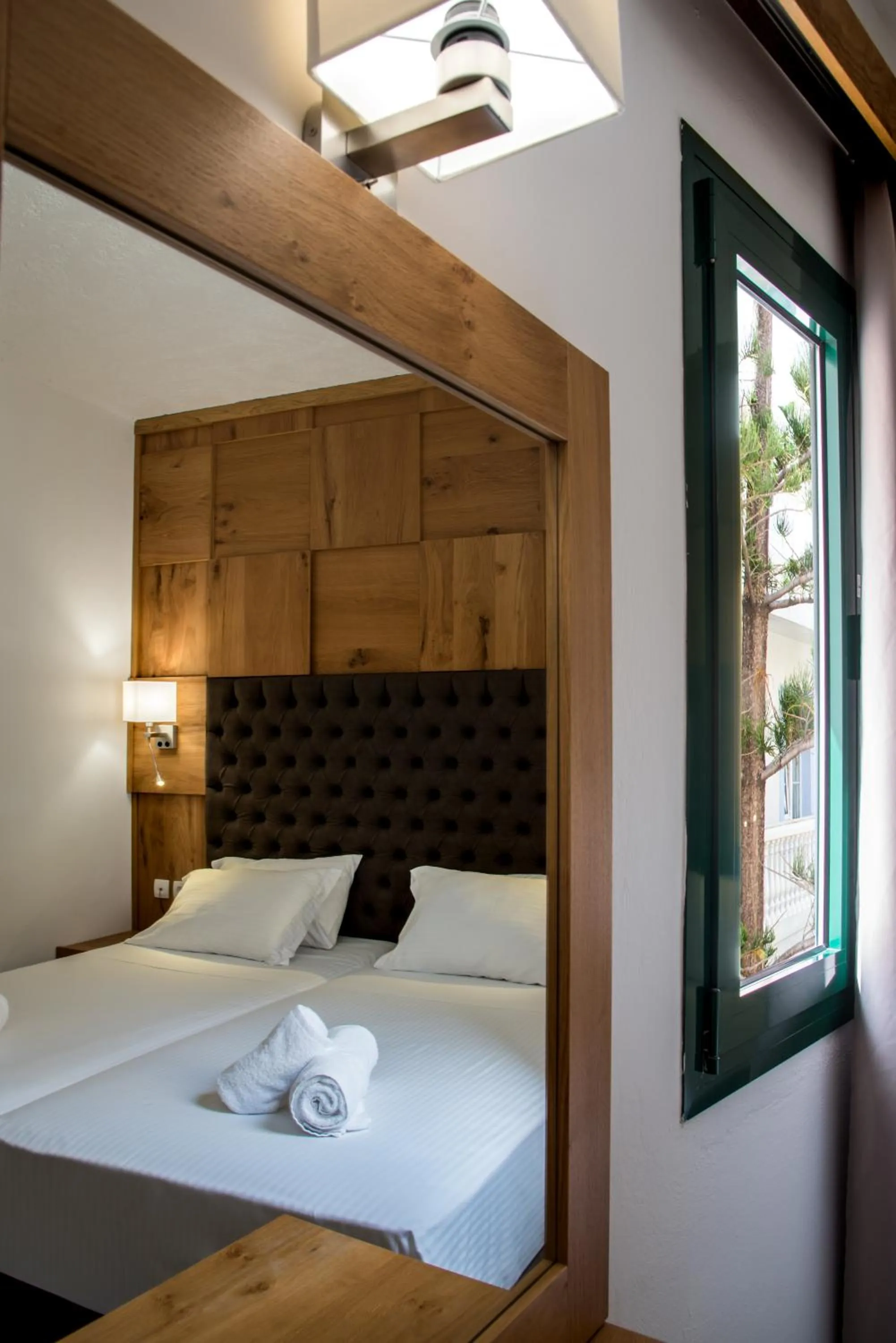 Bed in Elmi Beach Hotel & Suites