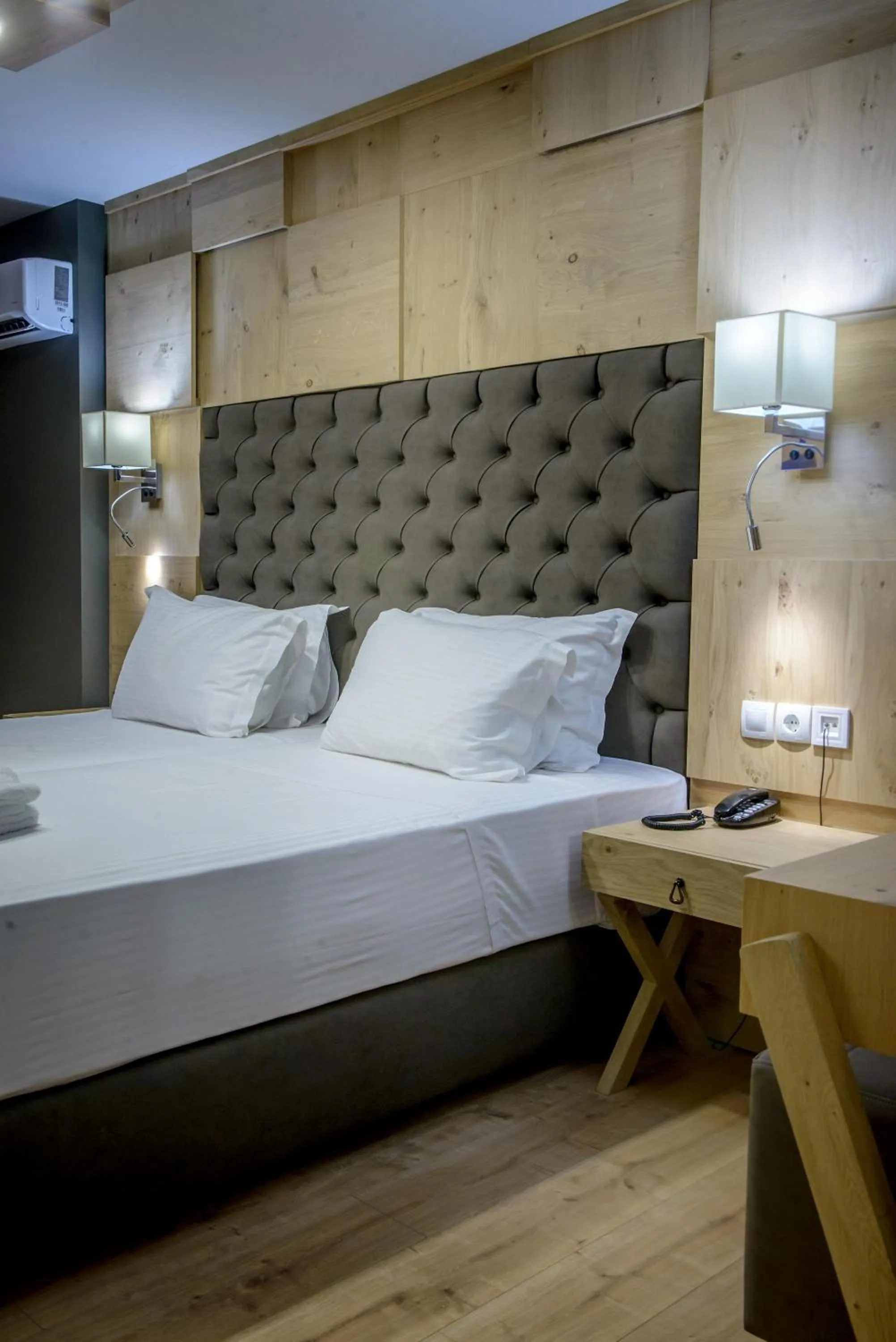 Bed in Elmi Beach Hotel & Suites