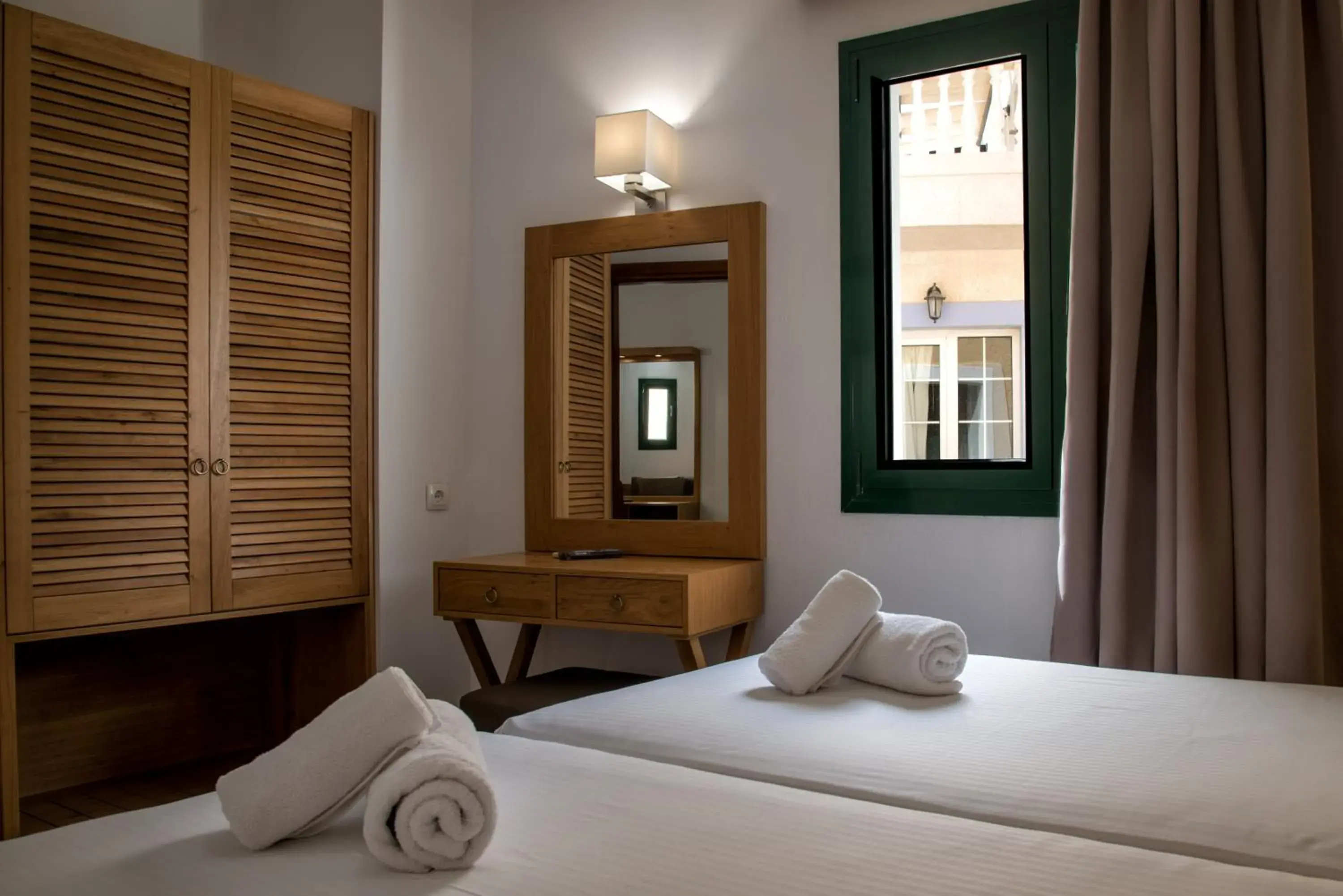 Bed in Elmi Beach Hotel & Suites Bed in Elmi Beach Hotel & Suites