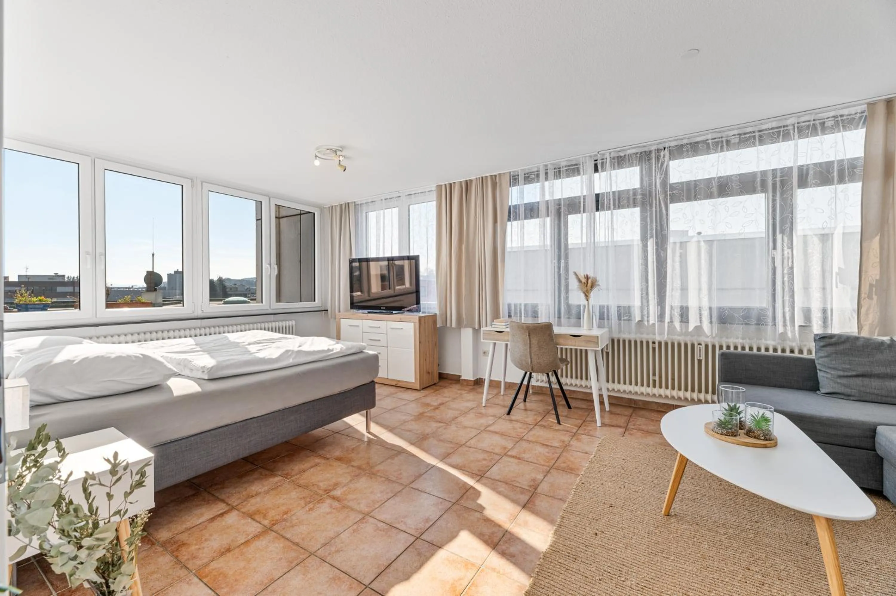 Communal lounge/ TV room, Bed in Atelier Guesthouse