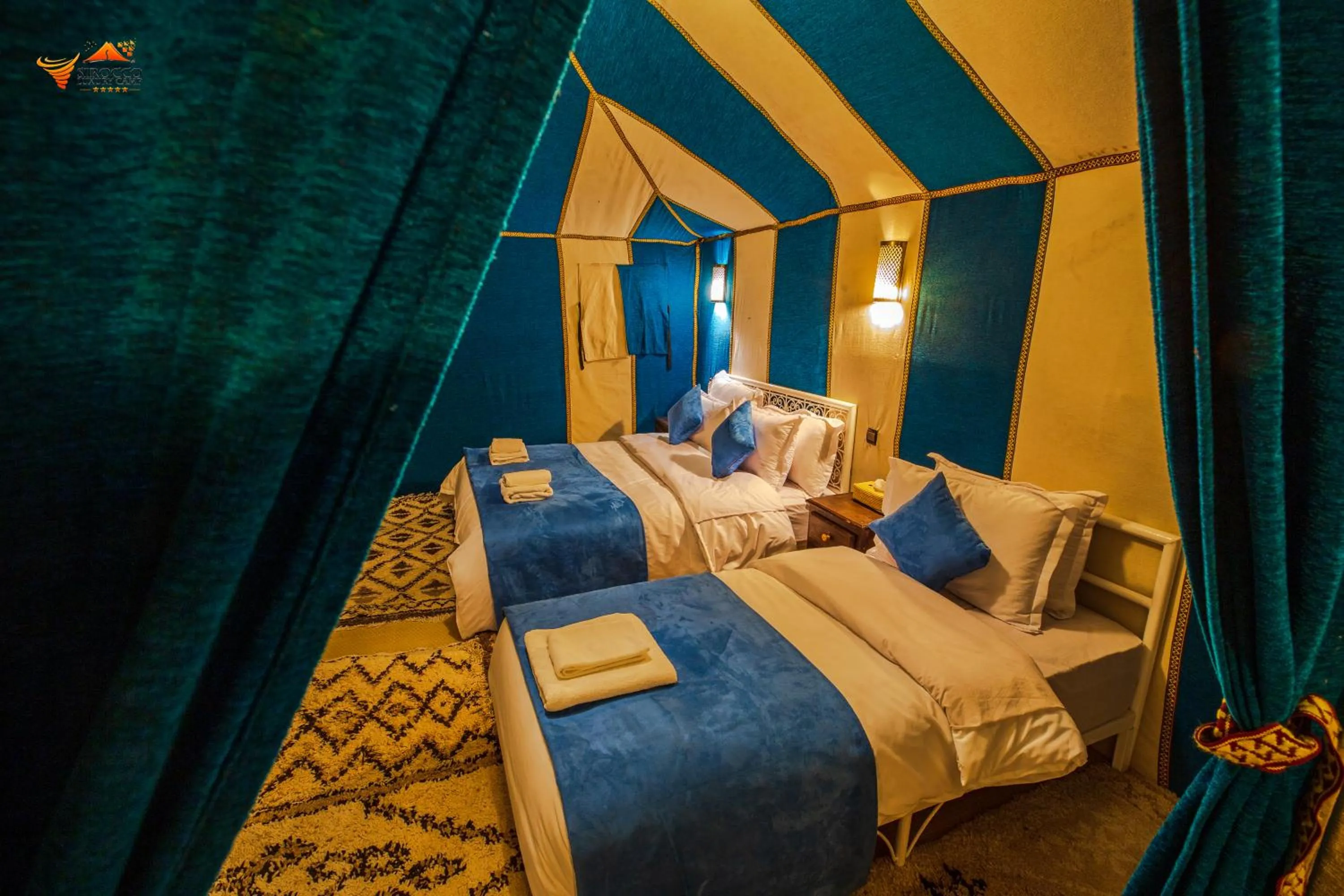 Bed in Sirocco Luxury Camp