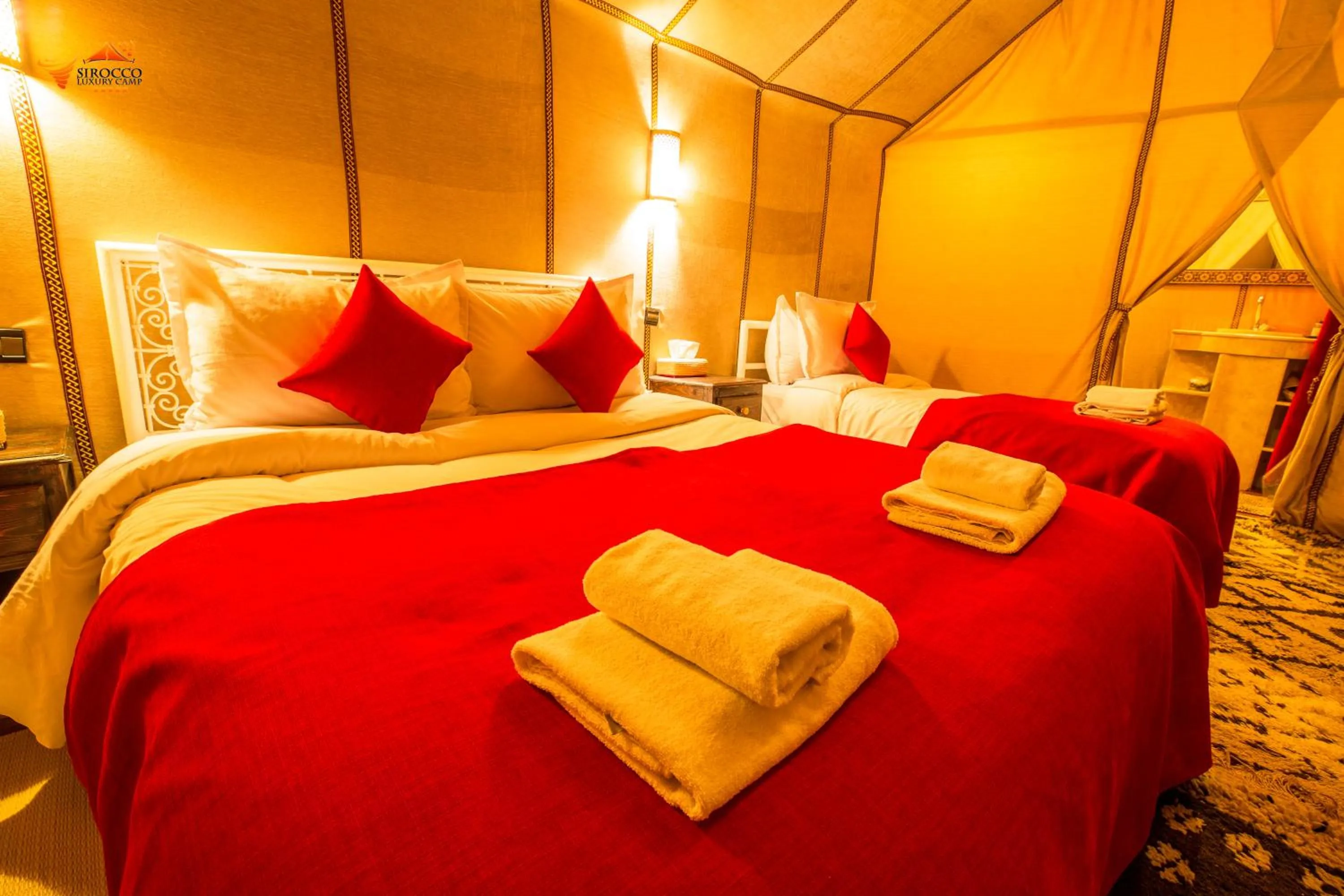 Bed in Sirocco Luxury Camp