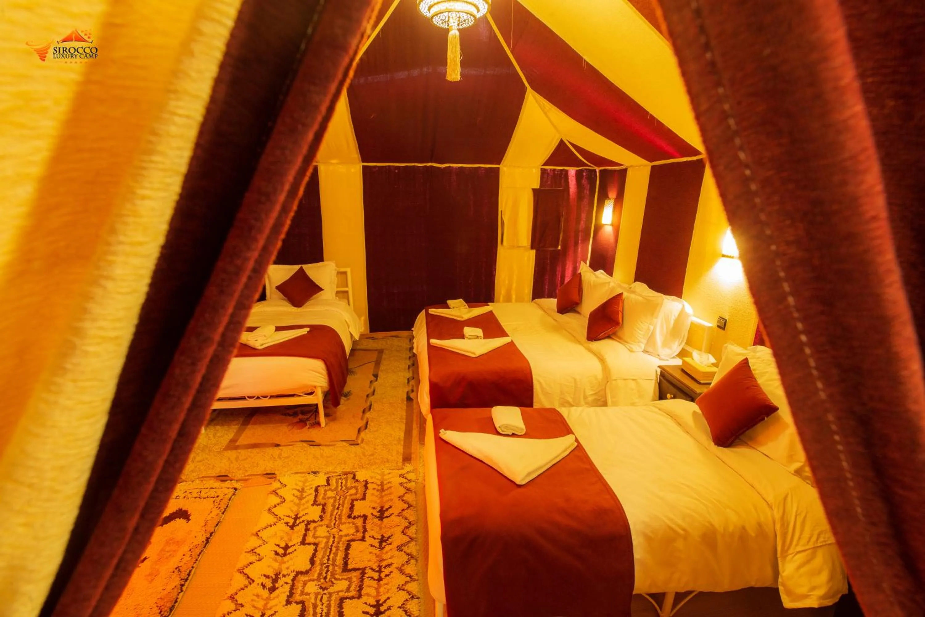 Bed in Sirocco Luxury Camp