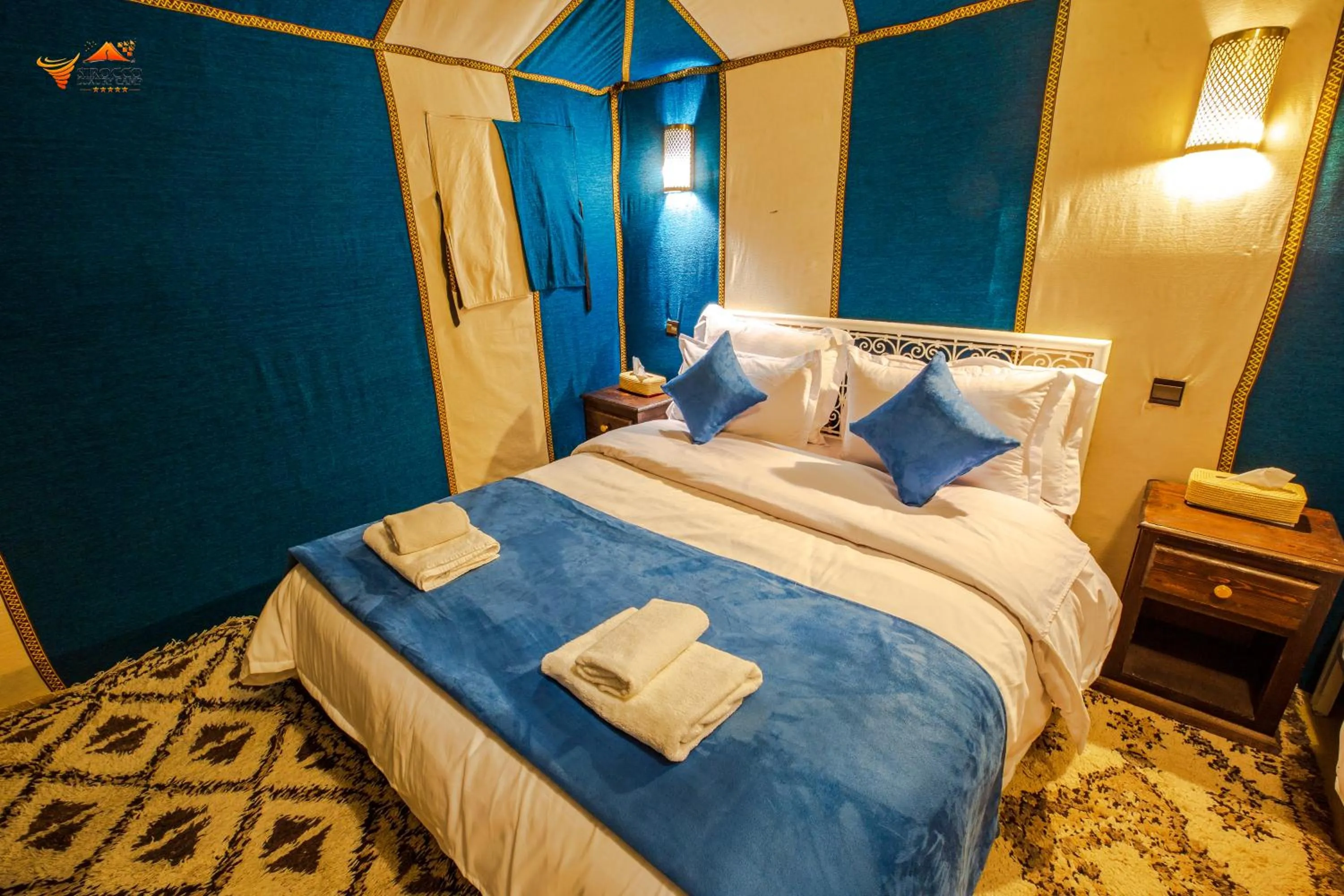 Bed in Sirocco Luxury Camp