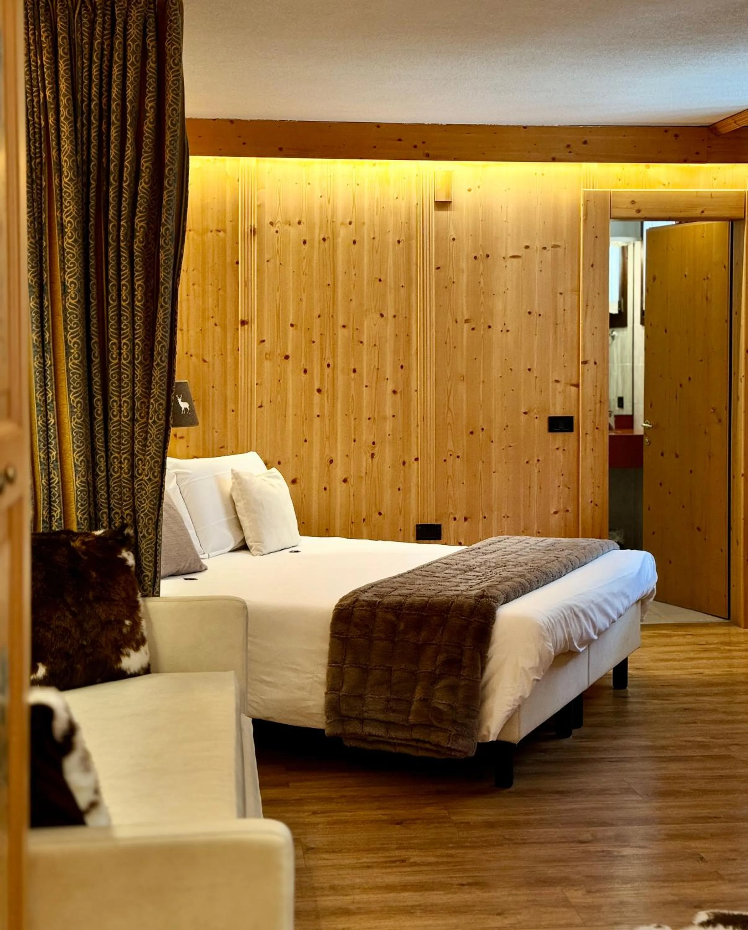 Bed in Hotel Caminetto