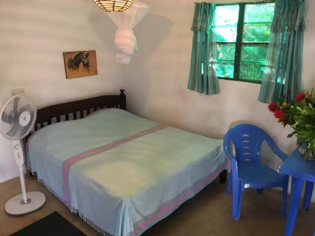 Bed in Tradewinds Lodge