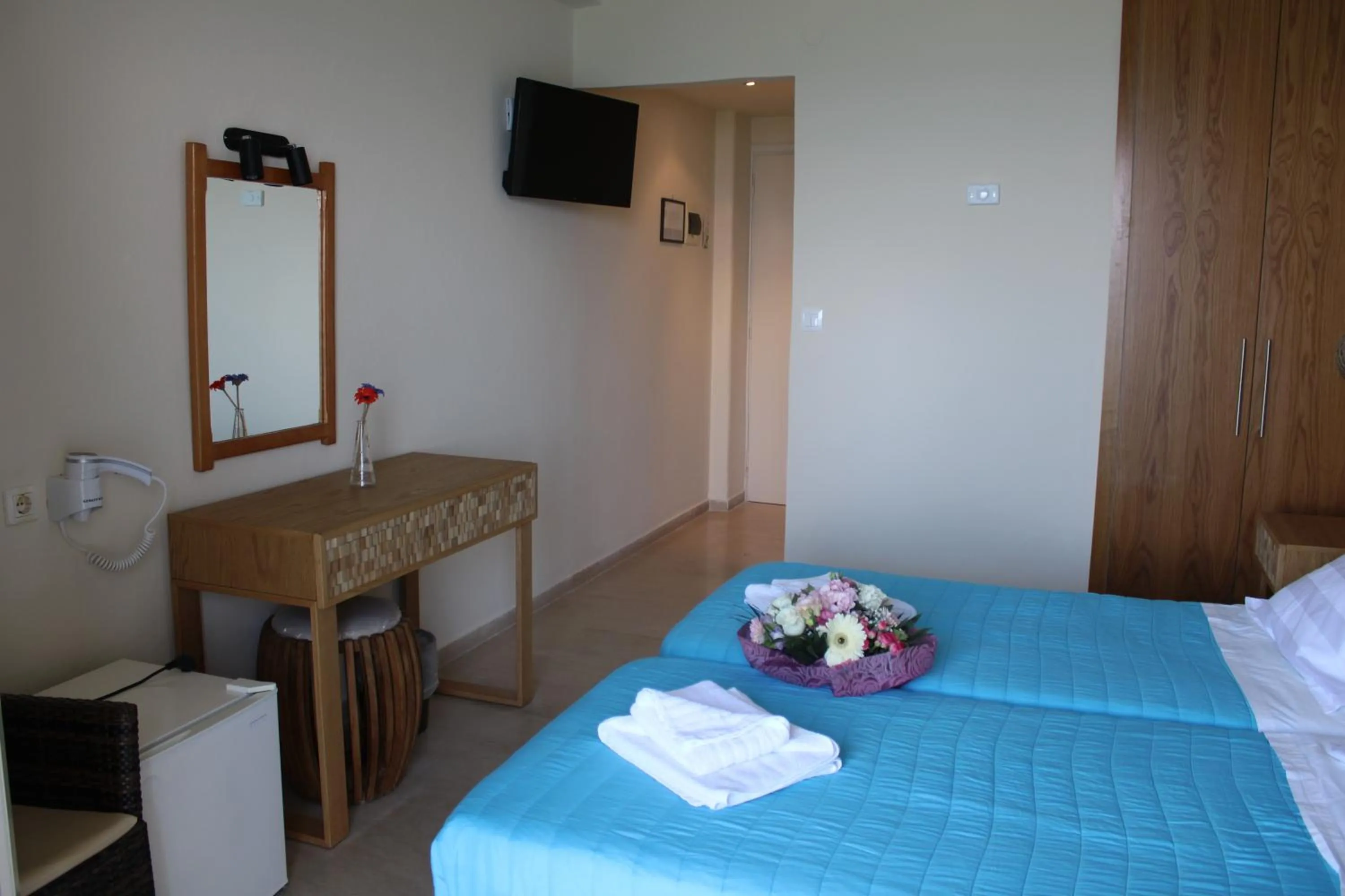 Bed in Dassia Beach Hotel