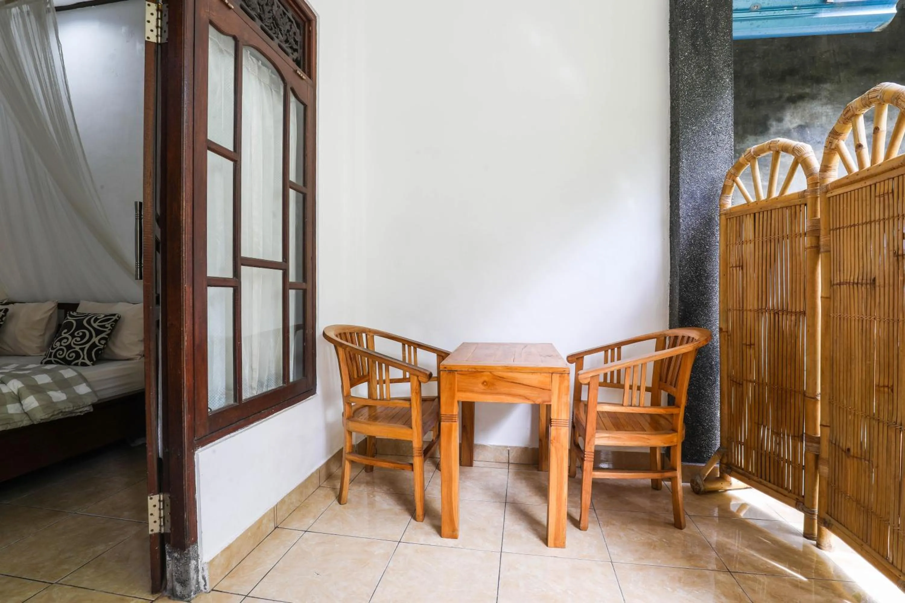 Seating area in Artha Dewata Home Stay