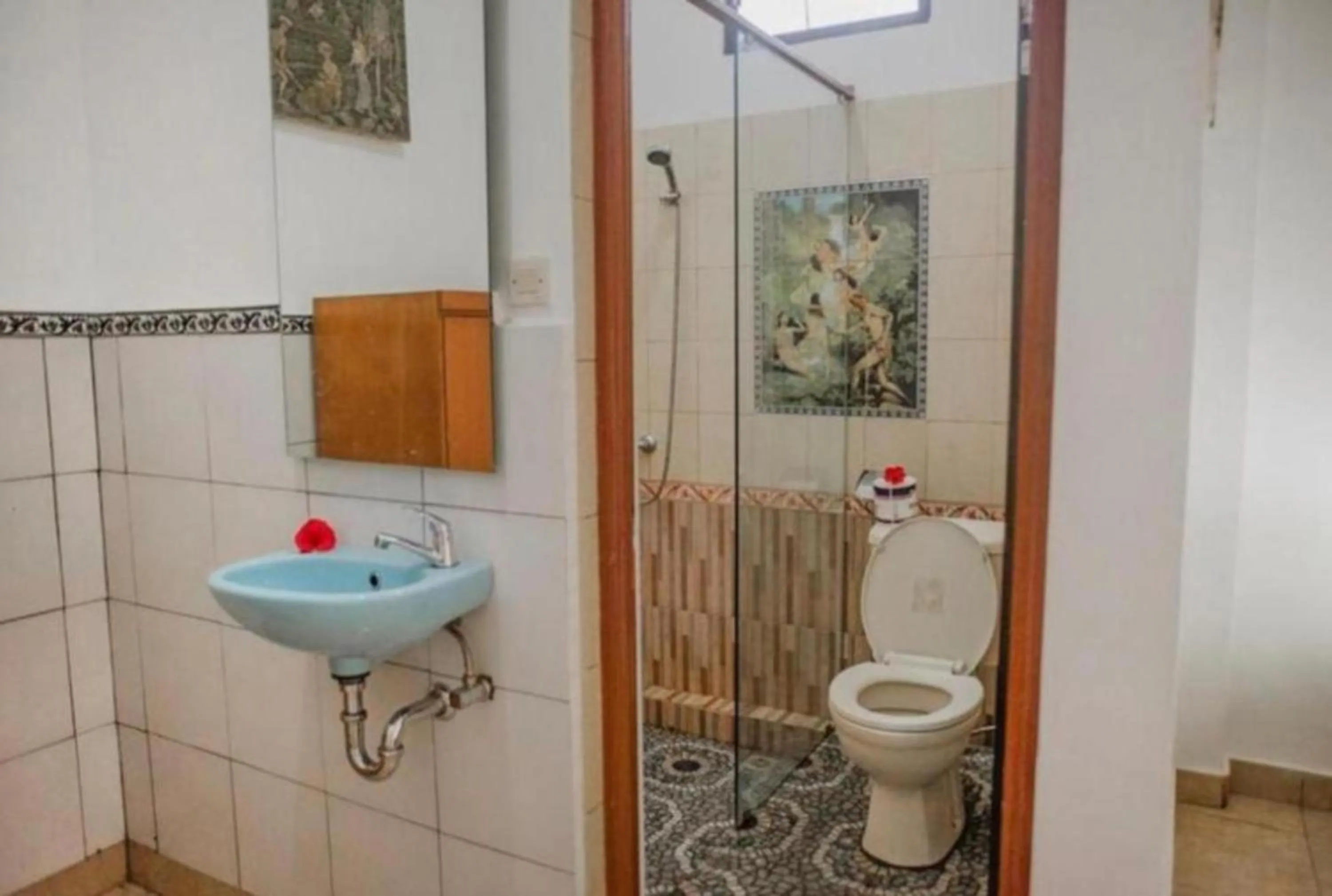 Toilet in Artha Dewata Home Stay