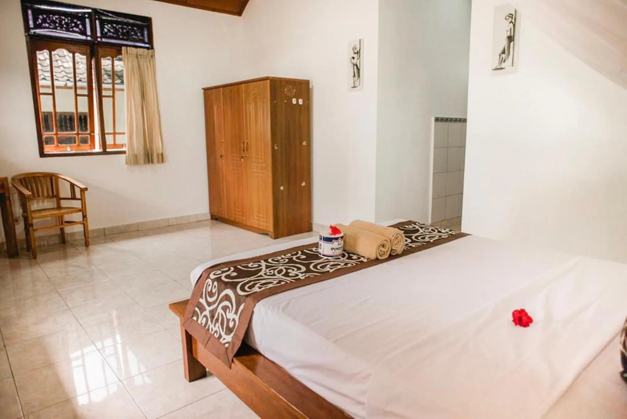 Bed in Artha Dewata Home Stay