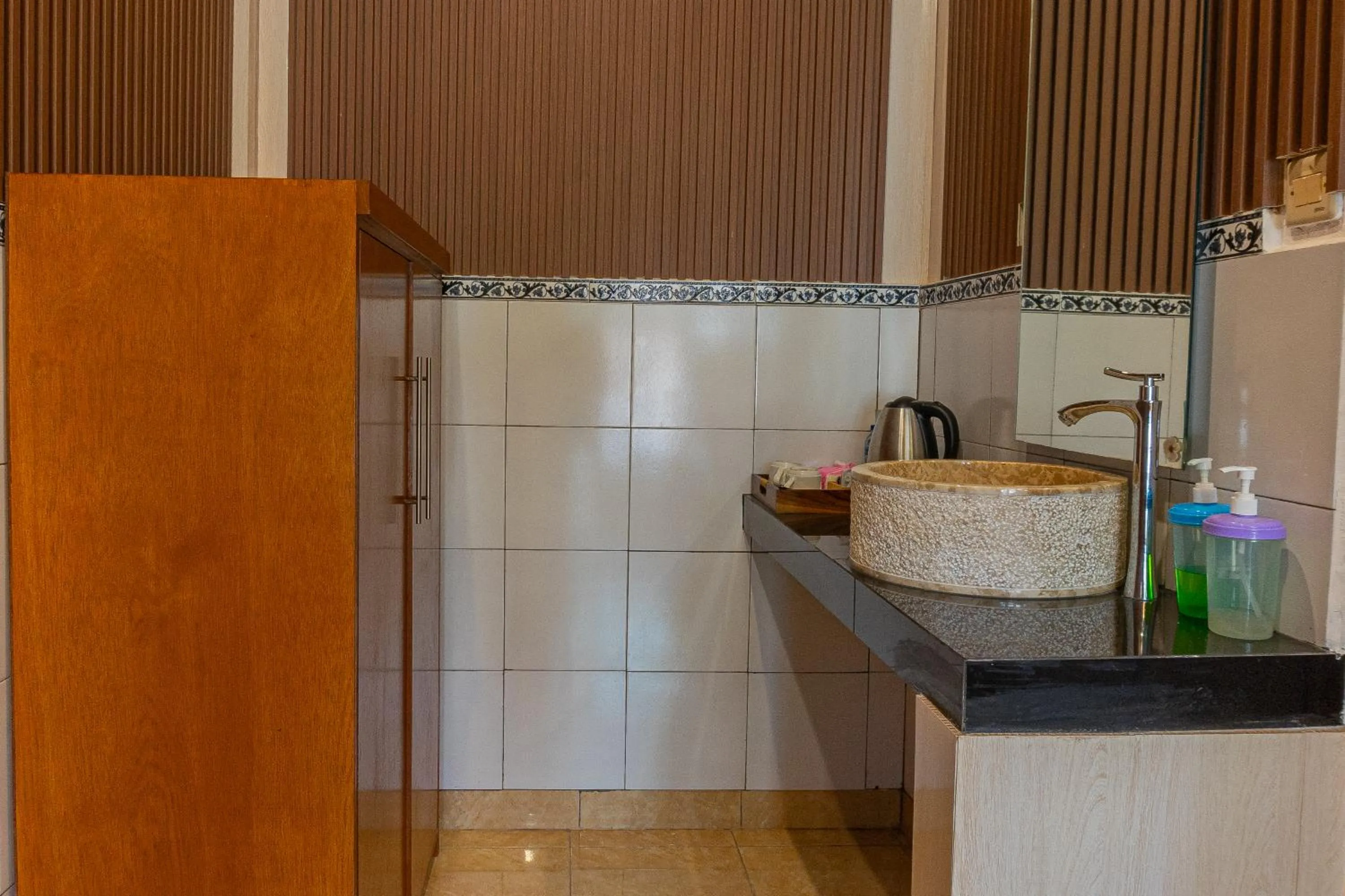 Bathroom in Artha Dewata Home Stay