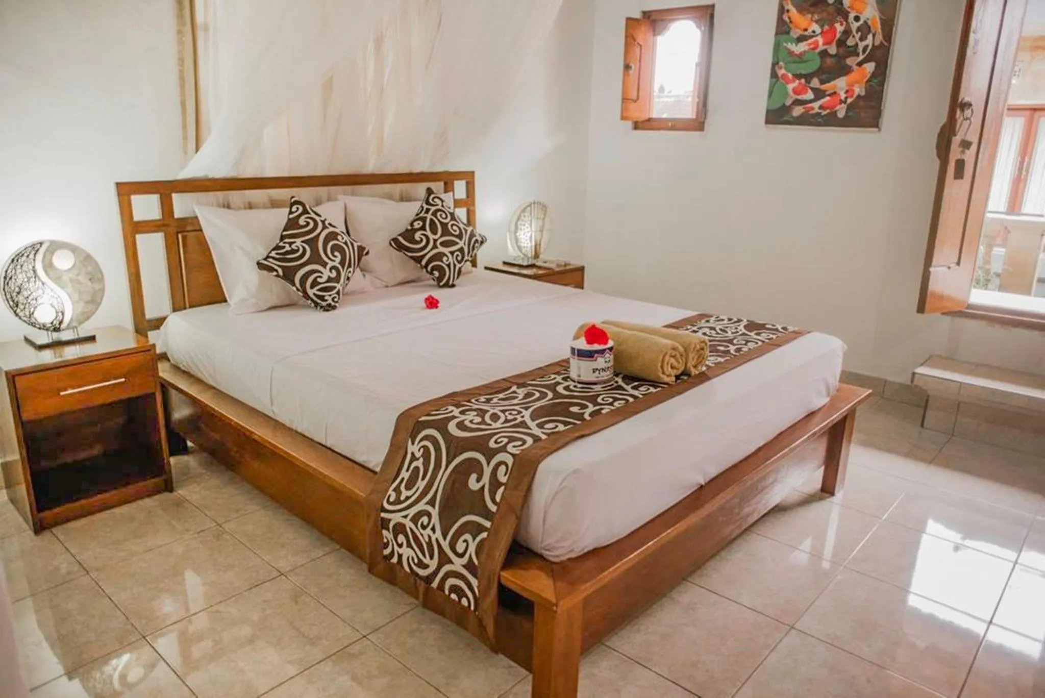 Bed in Artha Dewata Home Stay
