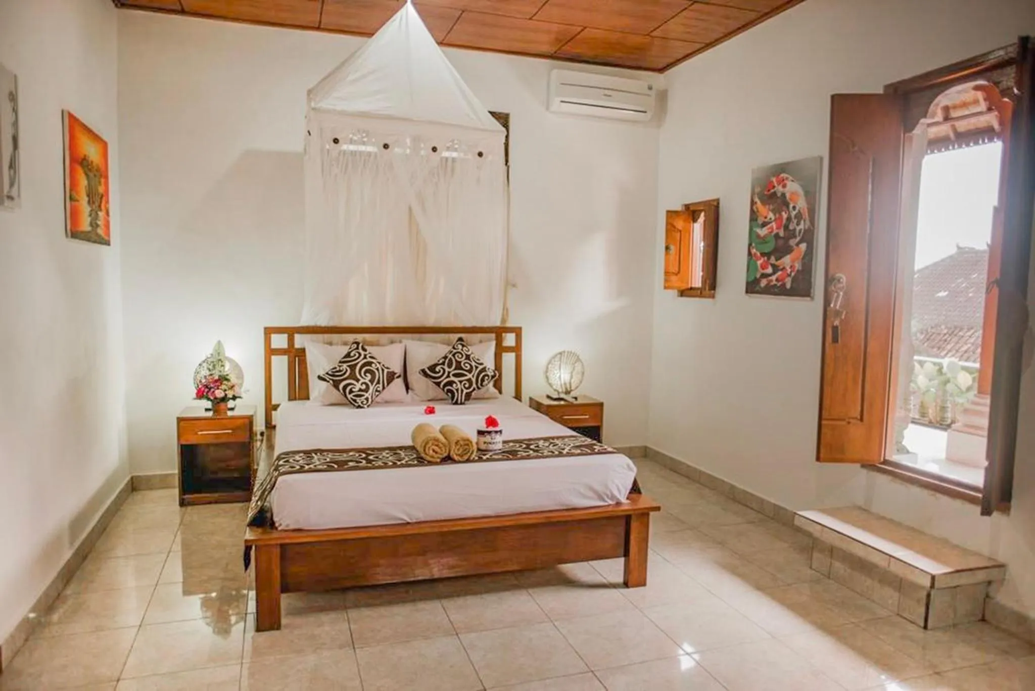 Bed in Artha Dewata Home Stay