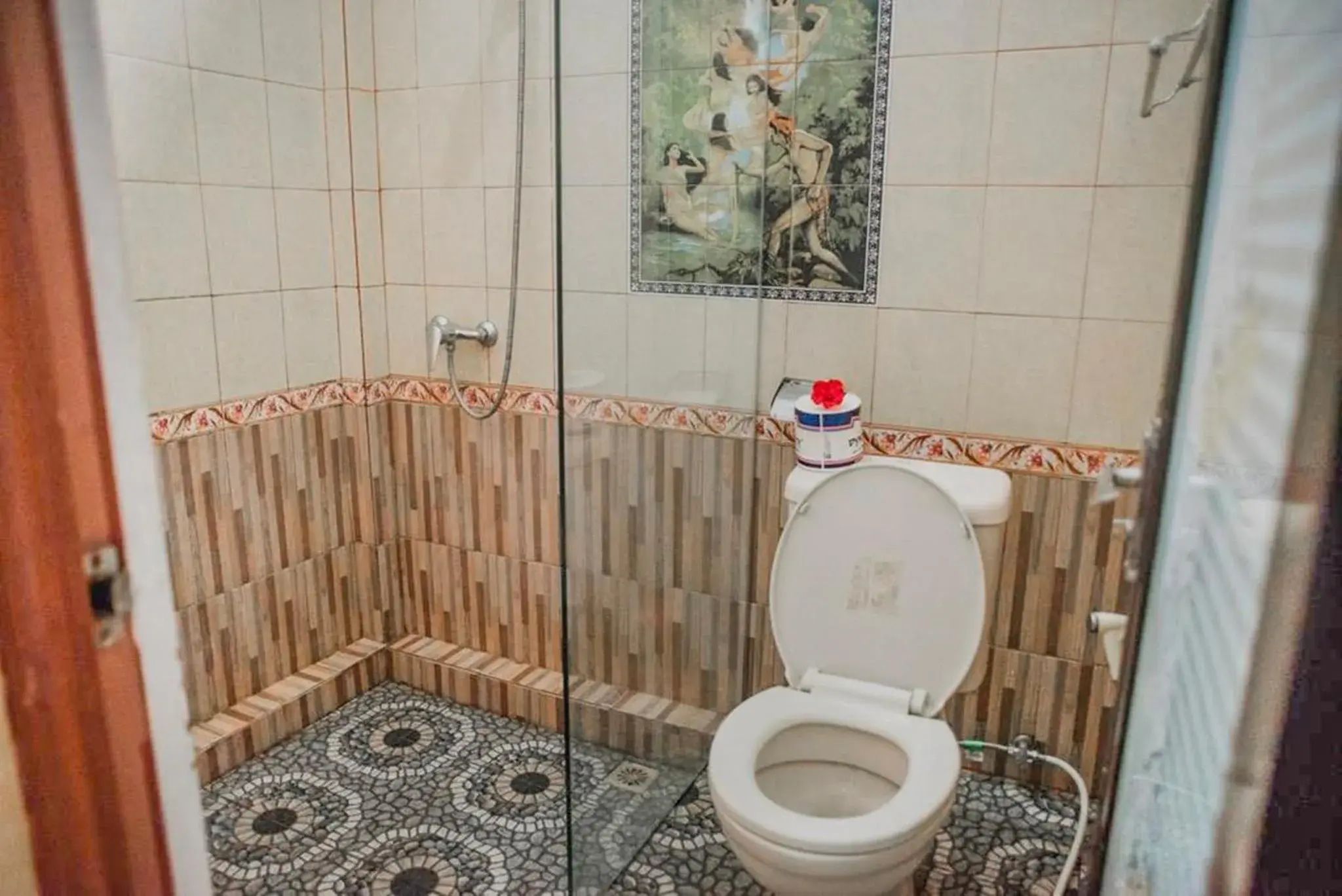 Toilet in Artha Dewata Home Stay Toilet in Artha Dewata Home Stay