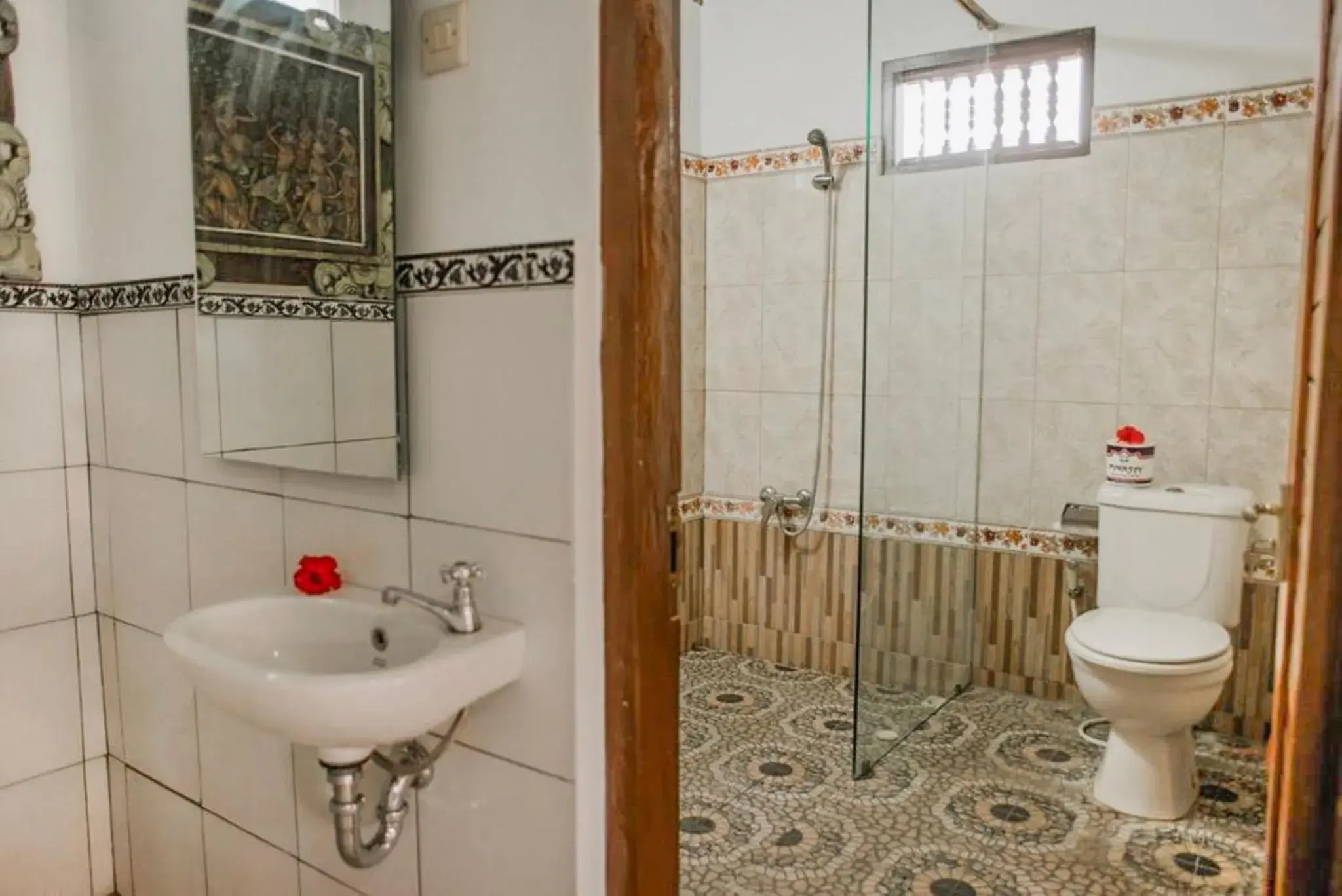 Shower in Artha Dewata Home Stay Shower in Artha Dewata Home Stay